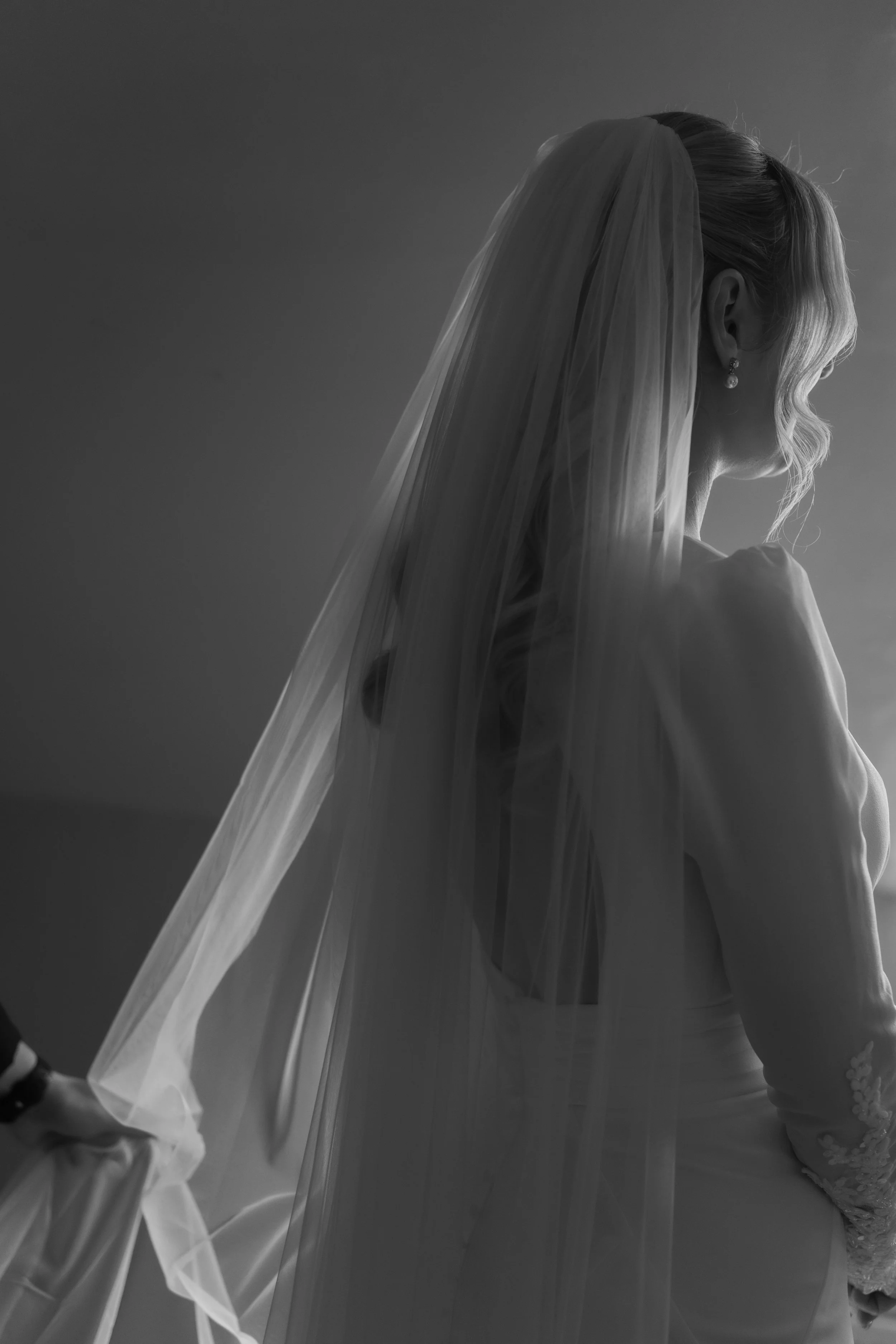 Candid bridal portrait in natural light at Charlton Hall, captured in a quiet moment before the ceremony
