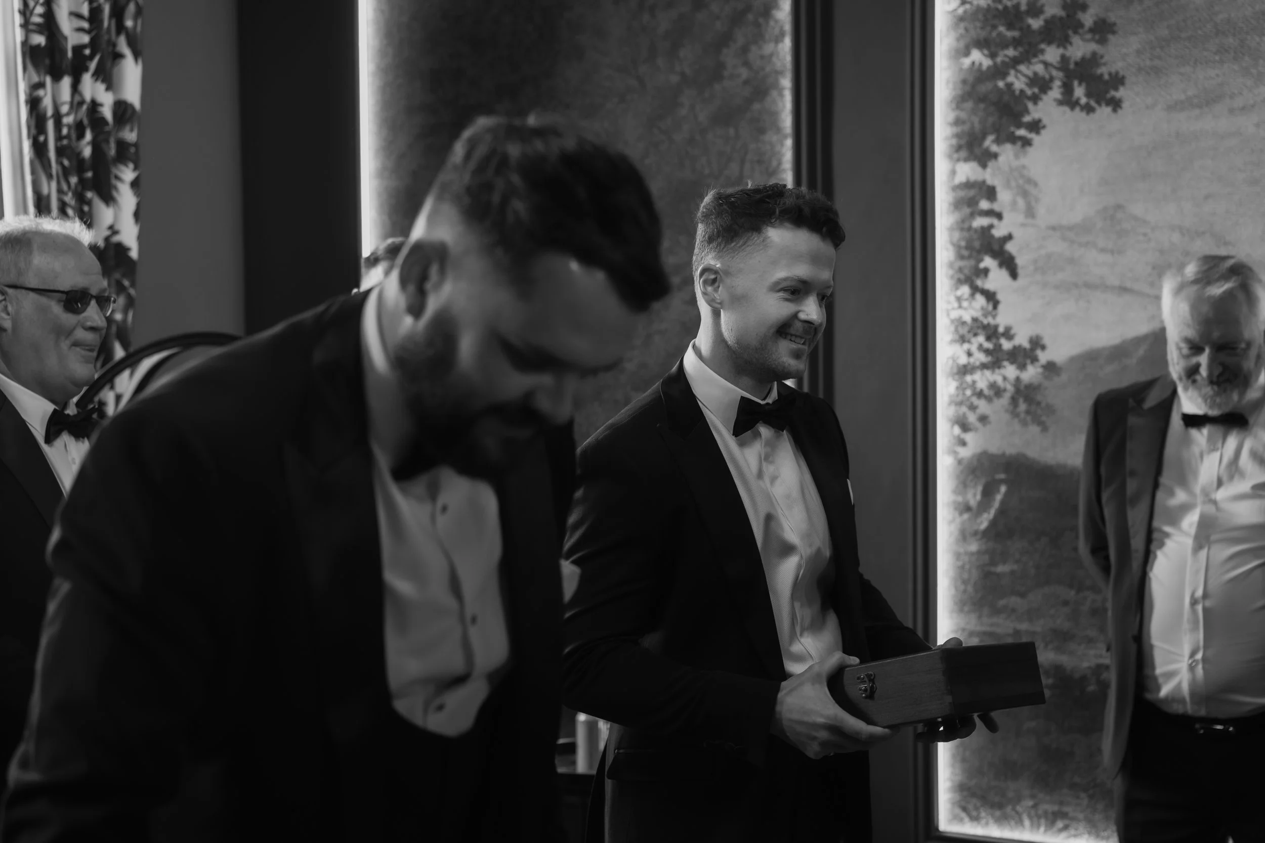 Emotional wedding morning as the groom thanks his groomsmen with thoughtful presents