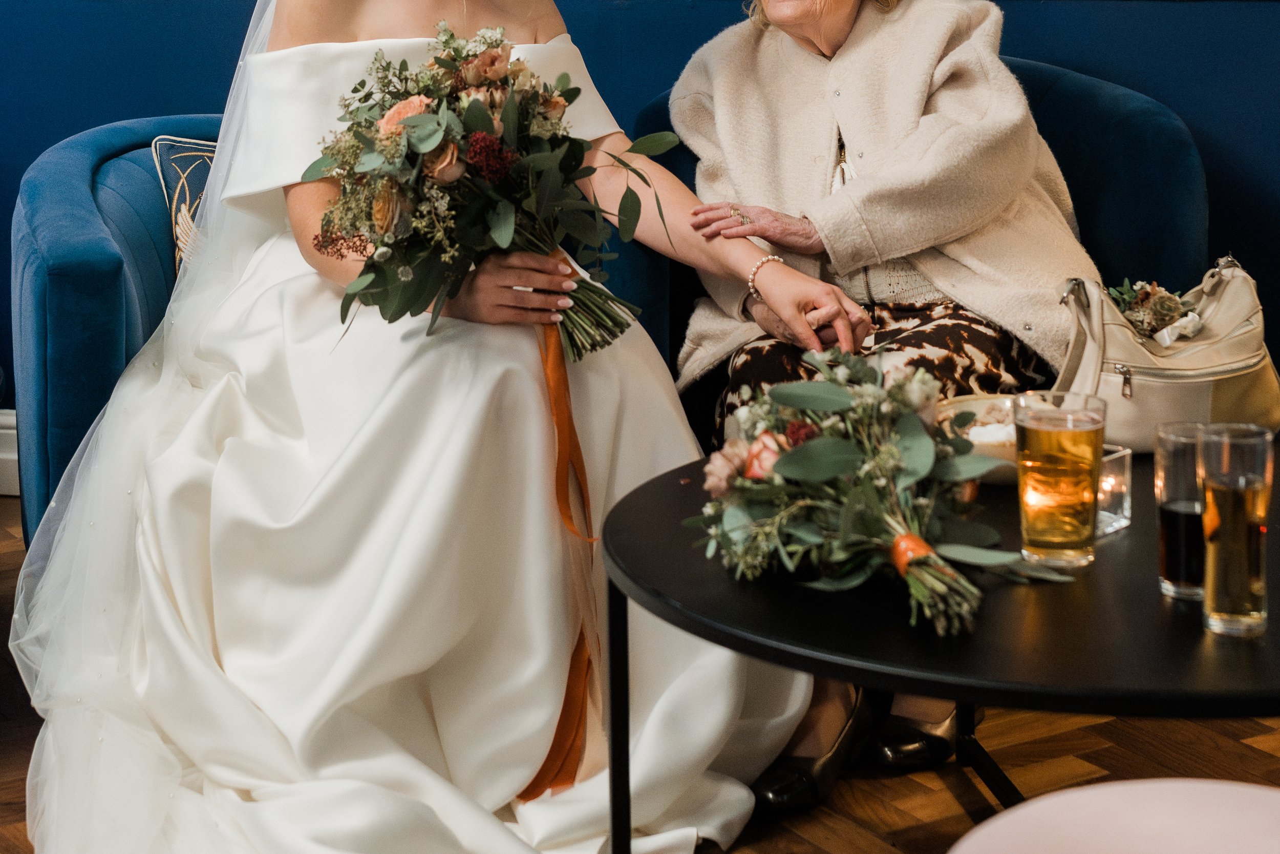L&J Wedding Photography & Videography. Documentary UK Weddings - Old Palace Chester. Reception drinks with guests. Bride with grandma. Naturally beautiful with a fine art flair.