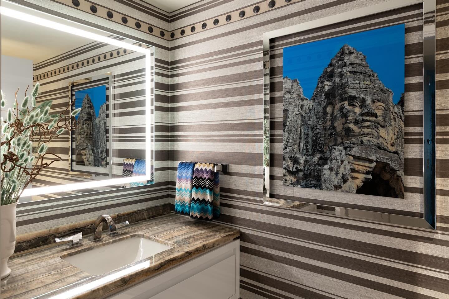 It takes a giant leap of faith when asking my clients trust me with a vision.  In this case I even shared a trim that was 1/4 of the size because I couldn&rsquo;t get a sample of the actual size I wanted.  This powder room is anchored by a photograph