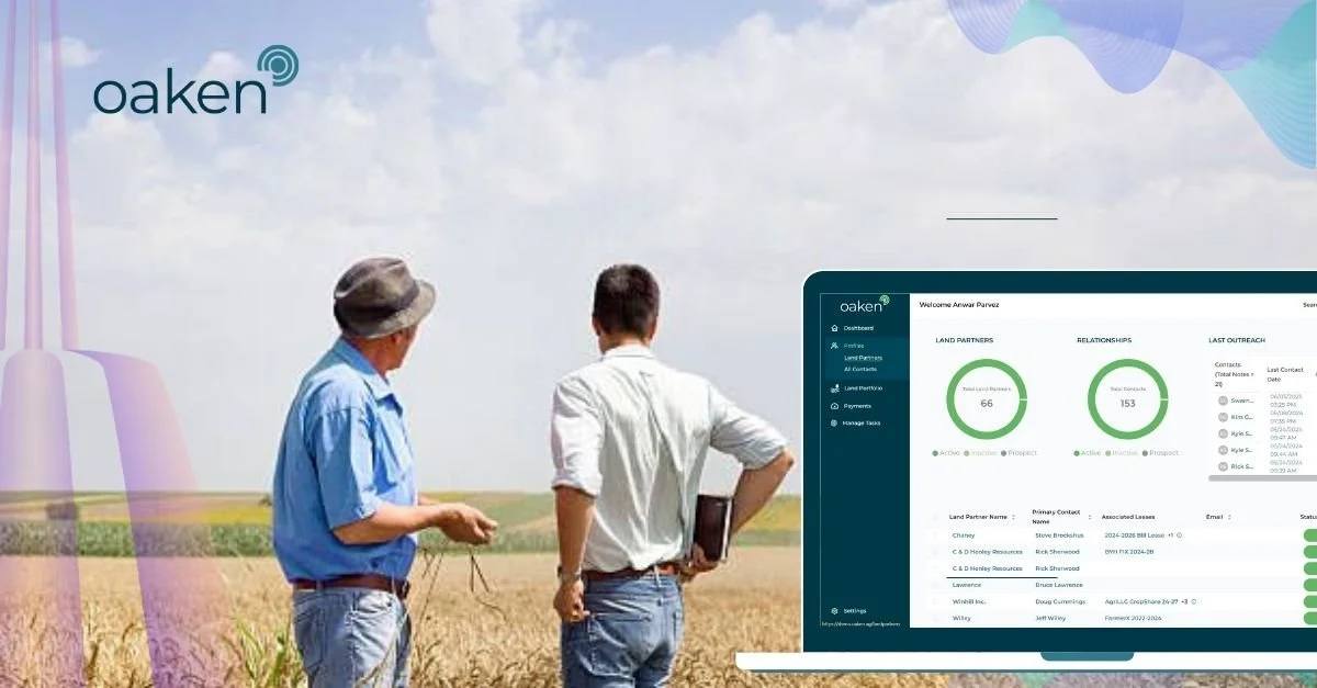 A farmer looking over a sunlit crop field, representing Oaken's digital farmland lease management and agribusiness contract intelligence platform.