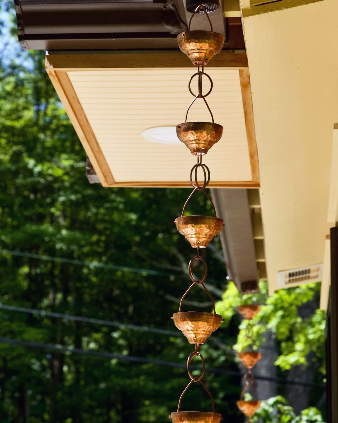 Copper rain chains are more than a beautiful detail - they turn rainwater into a stunning feature for your home. 🌧️✨

Copper rain chains add timeless character while providing a stylish alternative to traditional downspouts. 

Upgrade your gutters w