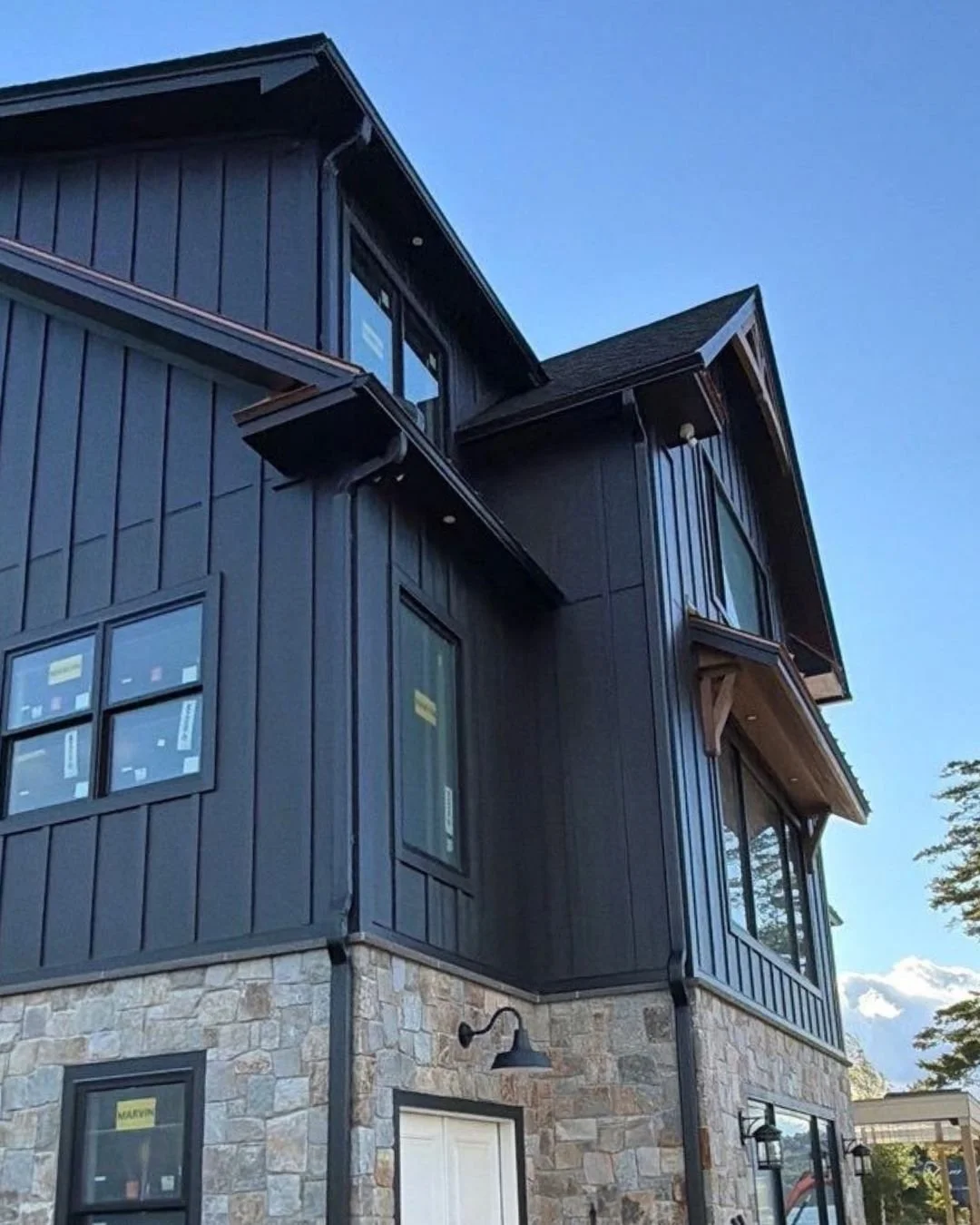 Clean lines, bold finish, and built to protect. 🏡🖤

Black Pro5K gutters add the perfect finishing touch to this new construction home in Chesterfield, NH. 
Installed by Legacy Gutter, they bring a sleek, modern look while helping keep rainwater flo