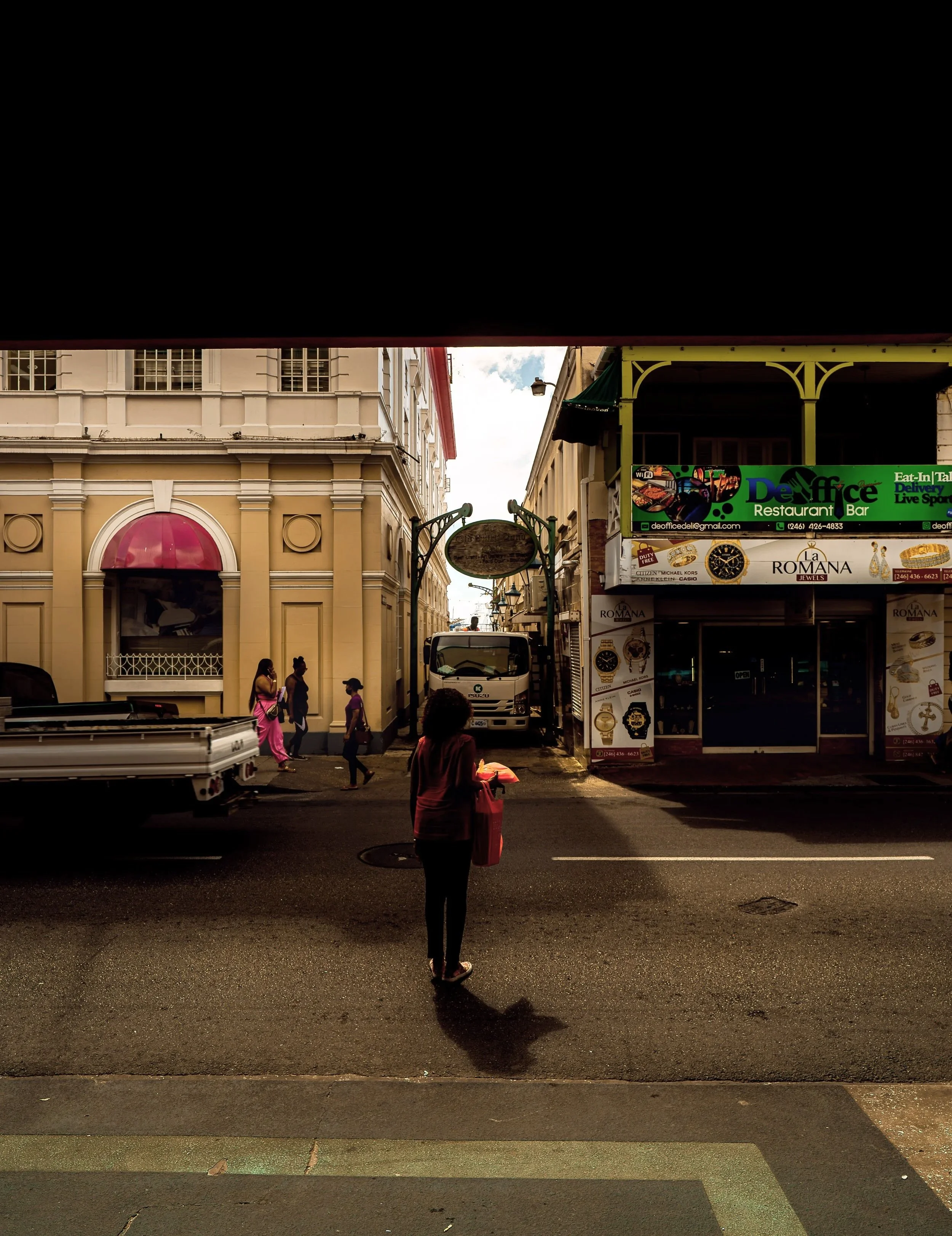 TRAVEL+Bridgetown+Woman+in+Street+BARBADOS+2026.jpg