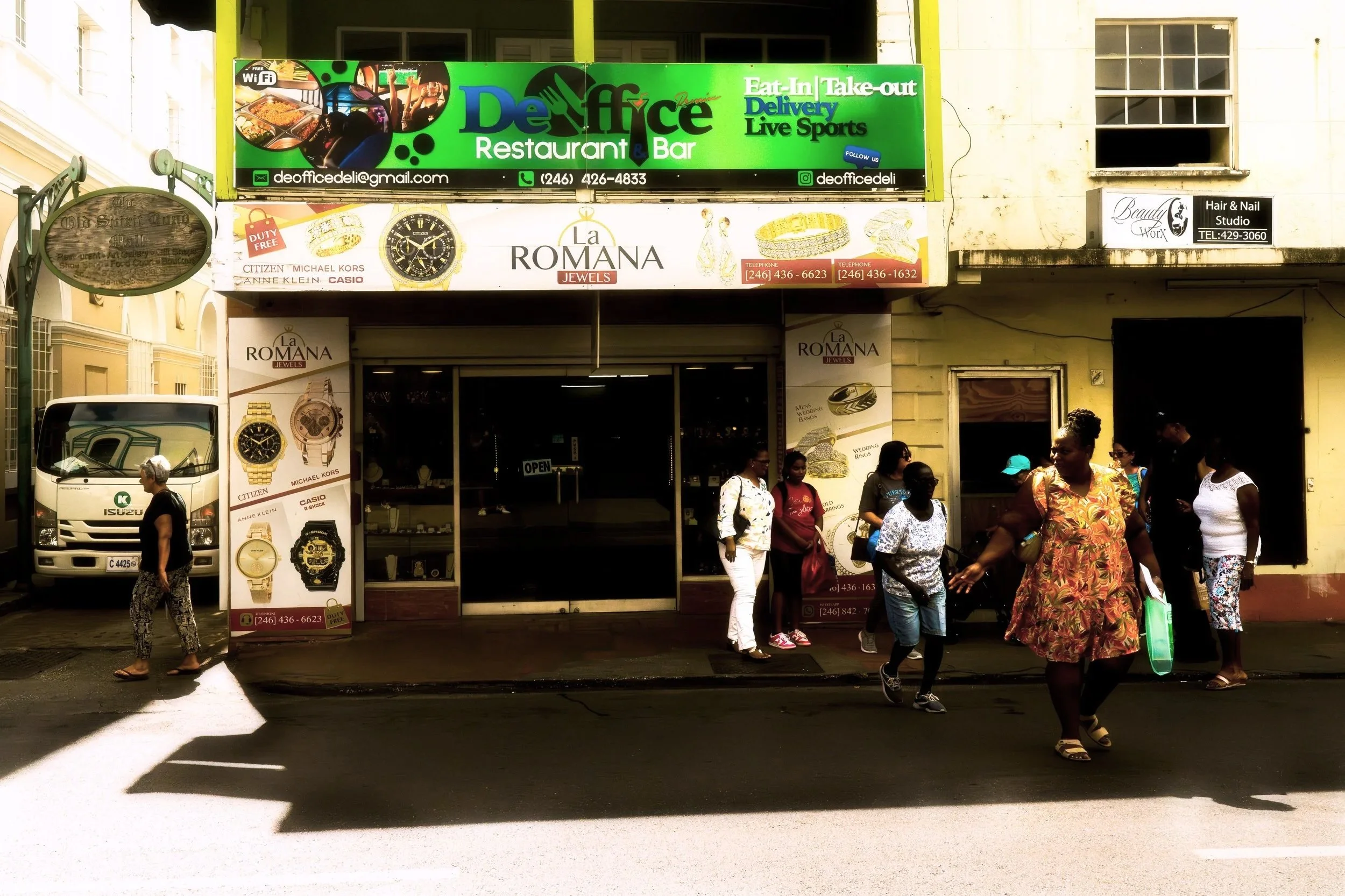 TRAVEL+Bridgetown+Group+Crossing+Street+BARBADOS+2026.jpg