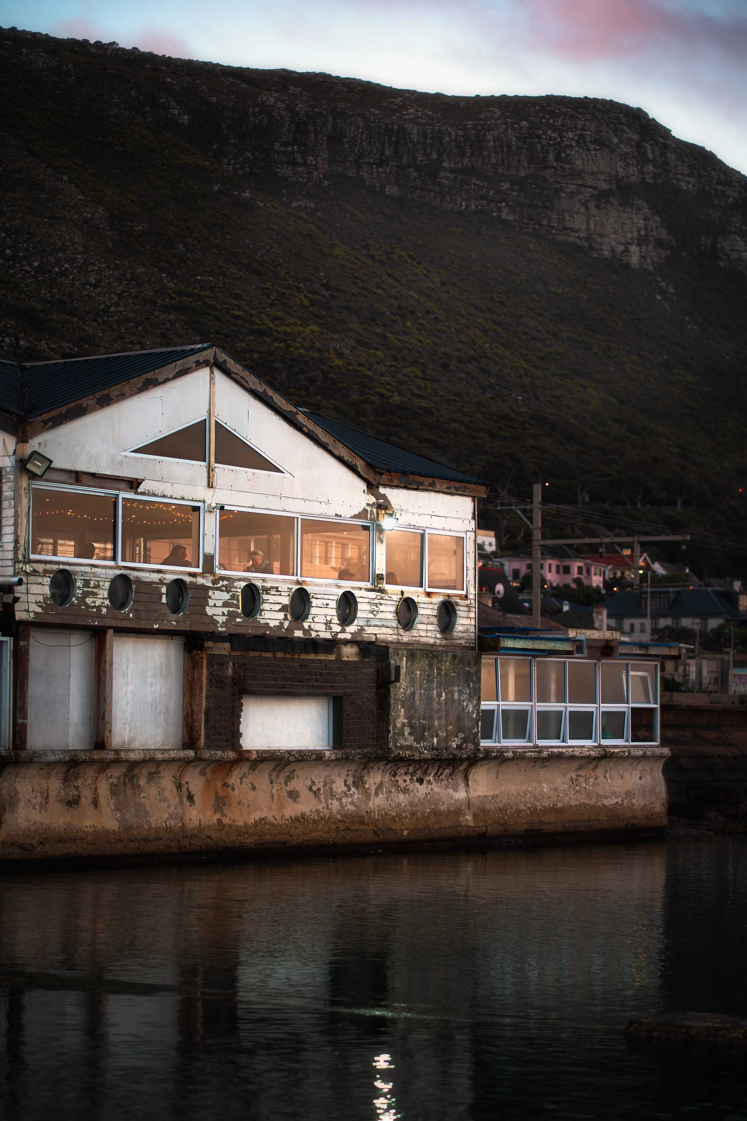TRAVEL Kalk Bay Brass Bell Dusk CAPE TOWN 2025.jpg