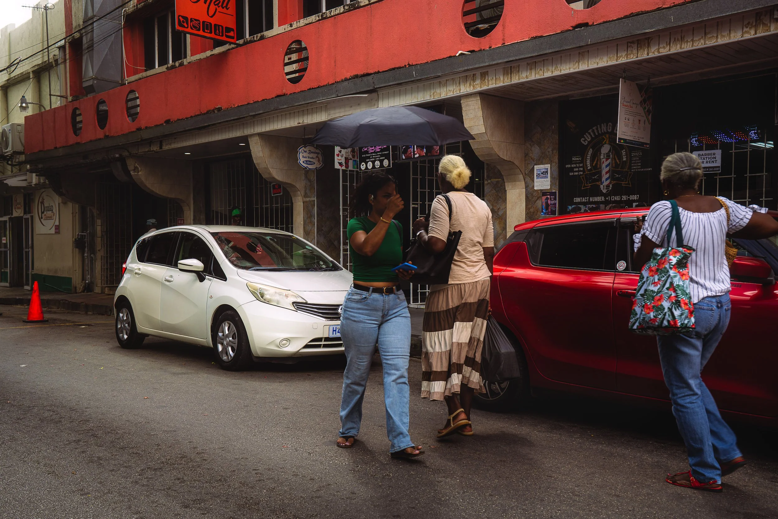 TRAVEL Bridgetown Umbrella Walker BARBADOS 2026.jpg