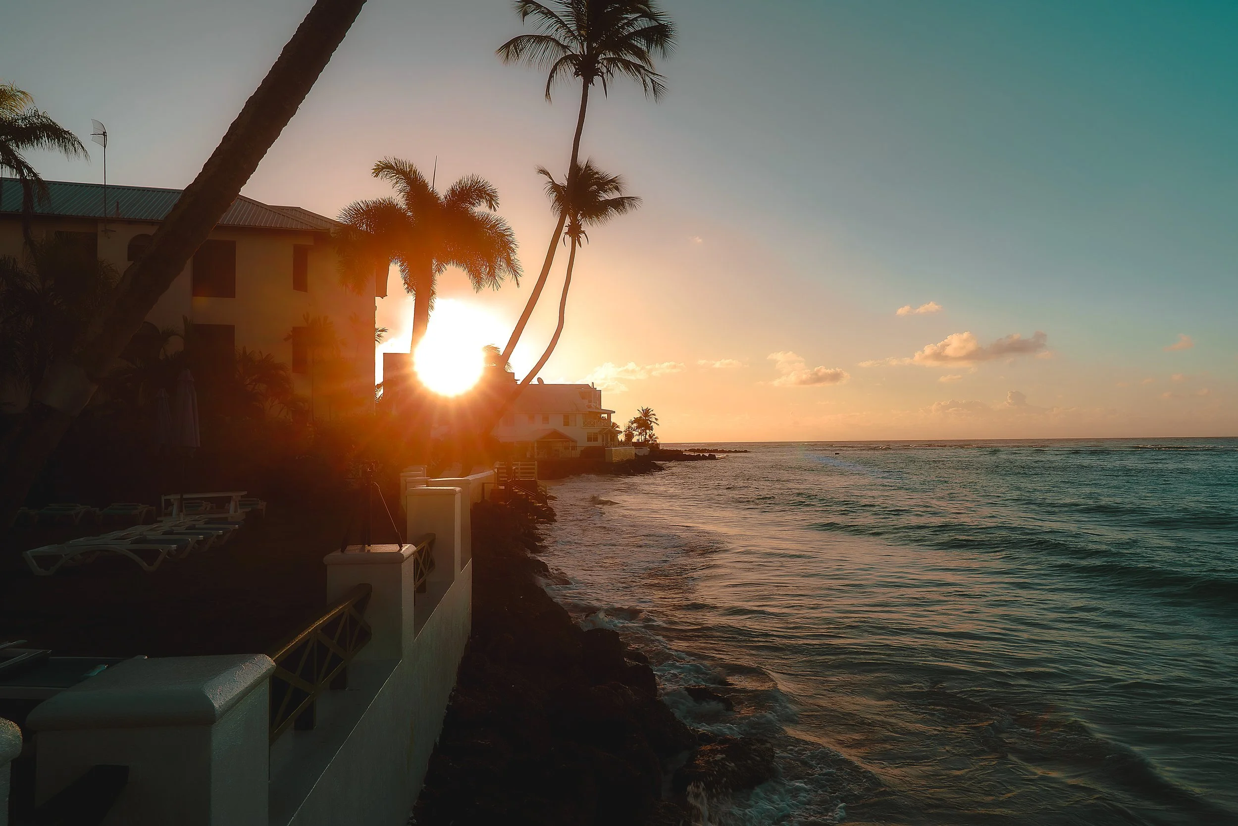 TRAVEL Worthing Beach Sunrise Over House with Rays BARBADOS 2026.jpg