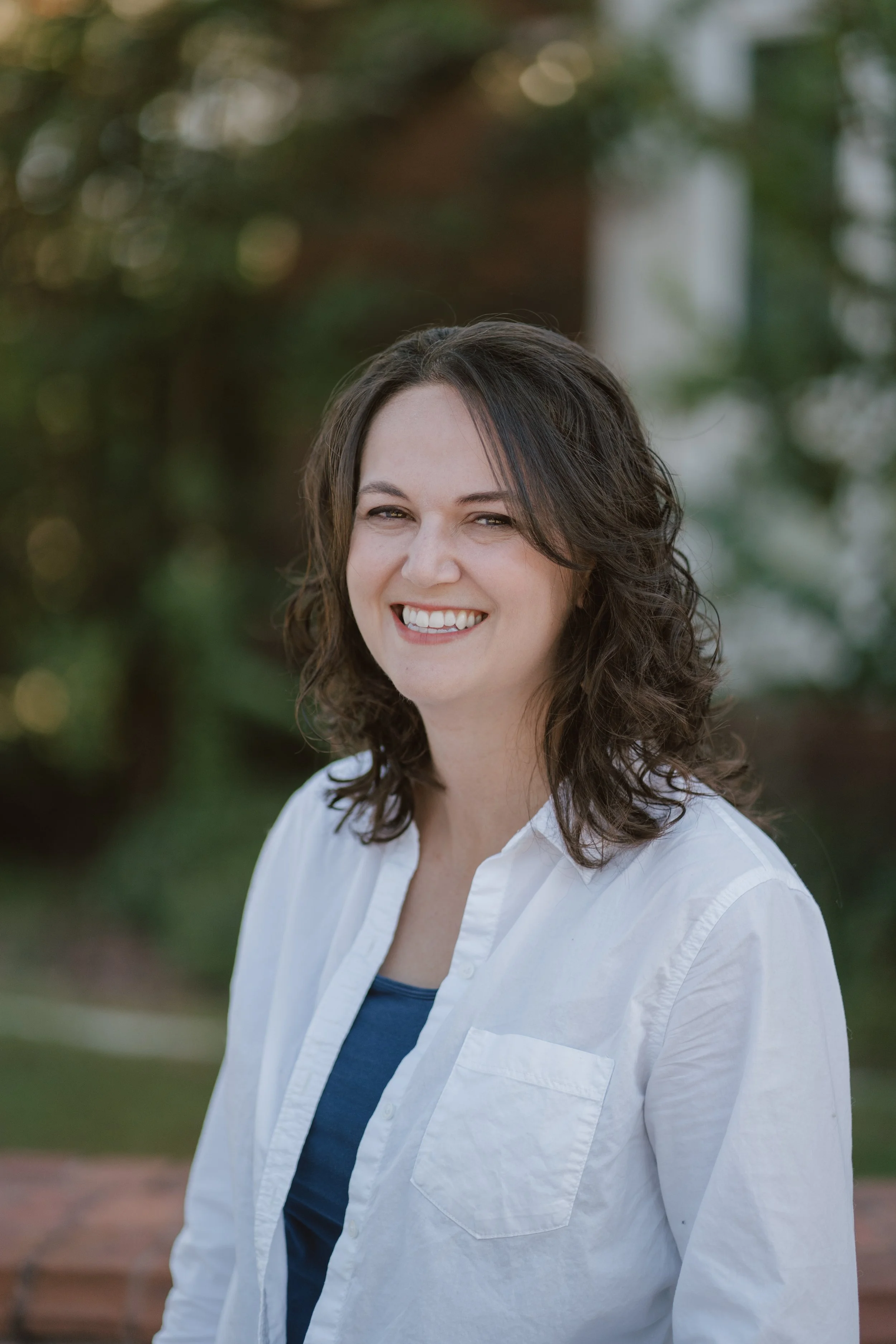   NICOLE MUNN  Marketing Specialist  