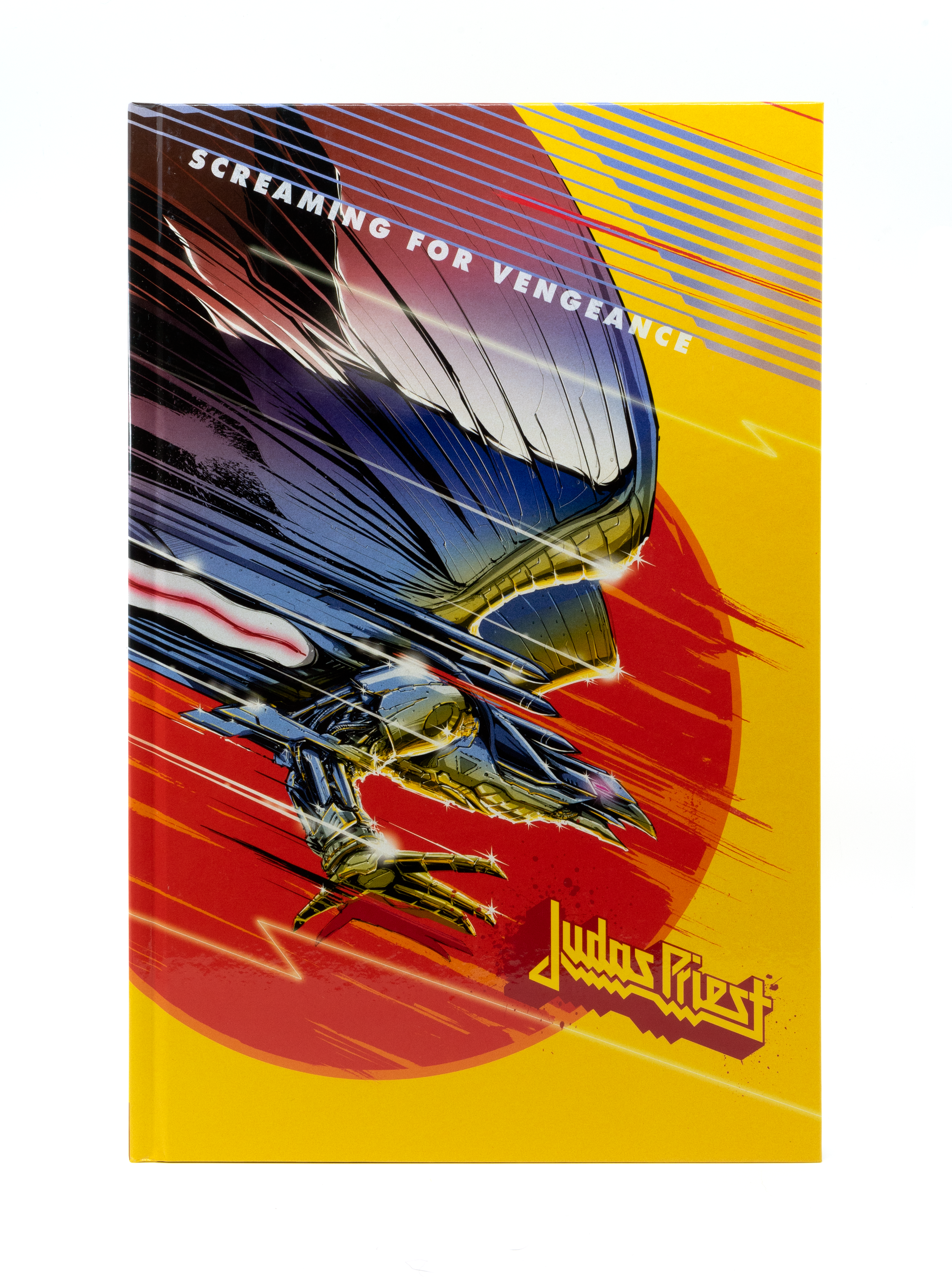 This book cover shows a blue robotic eagle illustrated by Jan Meininghaus. Behind the eagle is a red circle. The background is yellow. There are blue diagonal lines at the top. The text reads "Screaming For Vengeance" and shows the Judas Priest logo