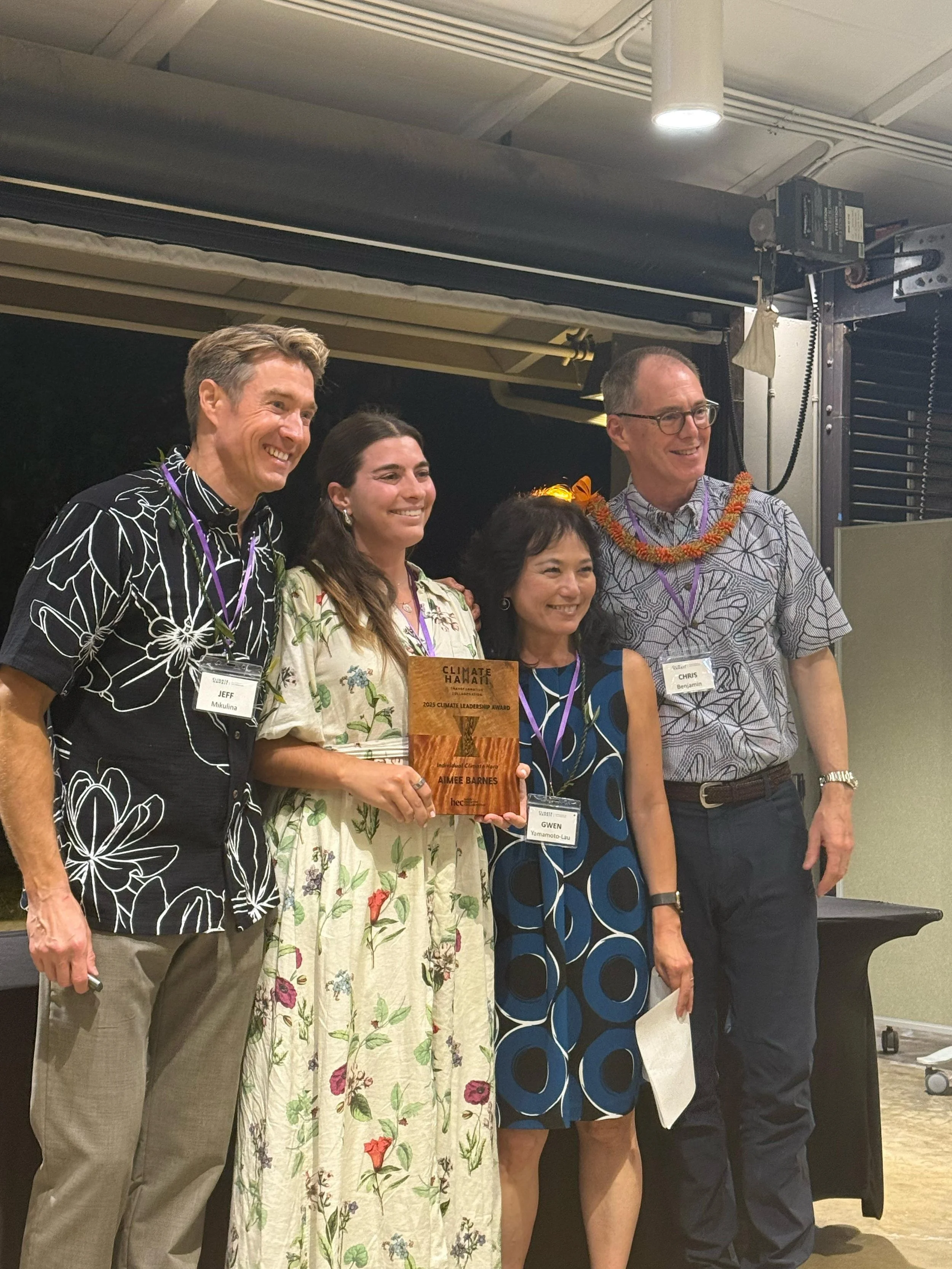 Camile Cleveland of Hua Nani Partners receiving the award on behalf of Aimee Barnes