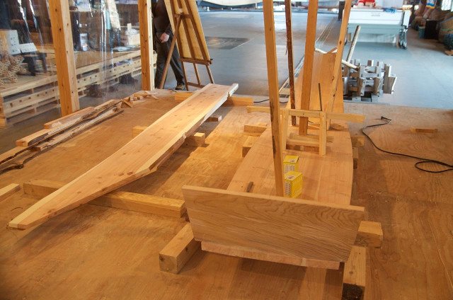 The backbone finished, with the side planks visible to the left. Note how the sides of the transom overhang the bottom. The sides will butt to the forward face of the transom.