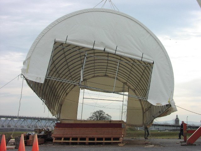 A crane first lifted the building then turned the hull over.