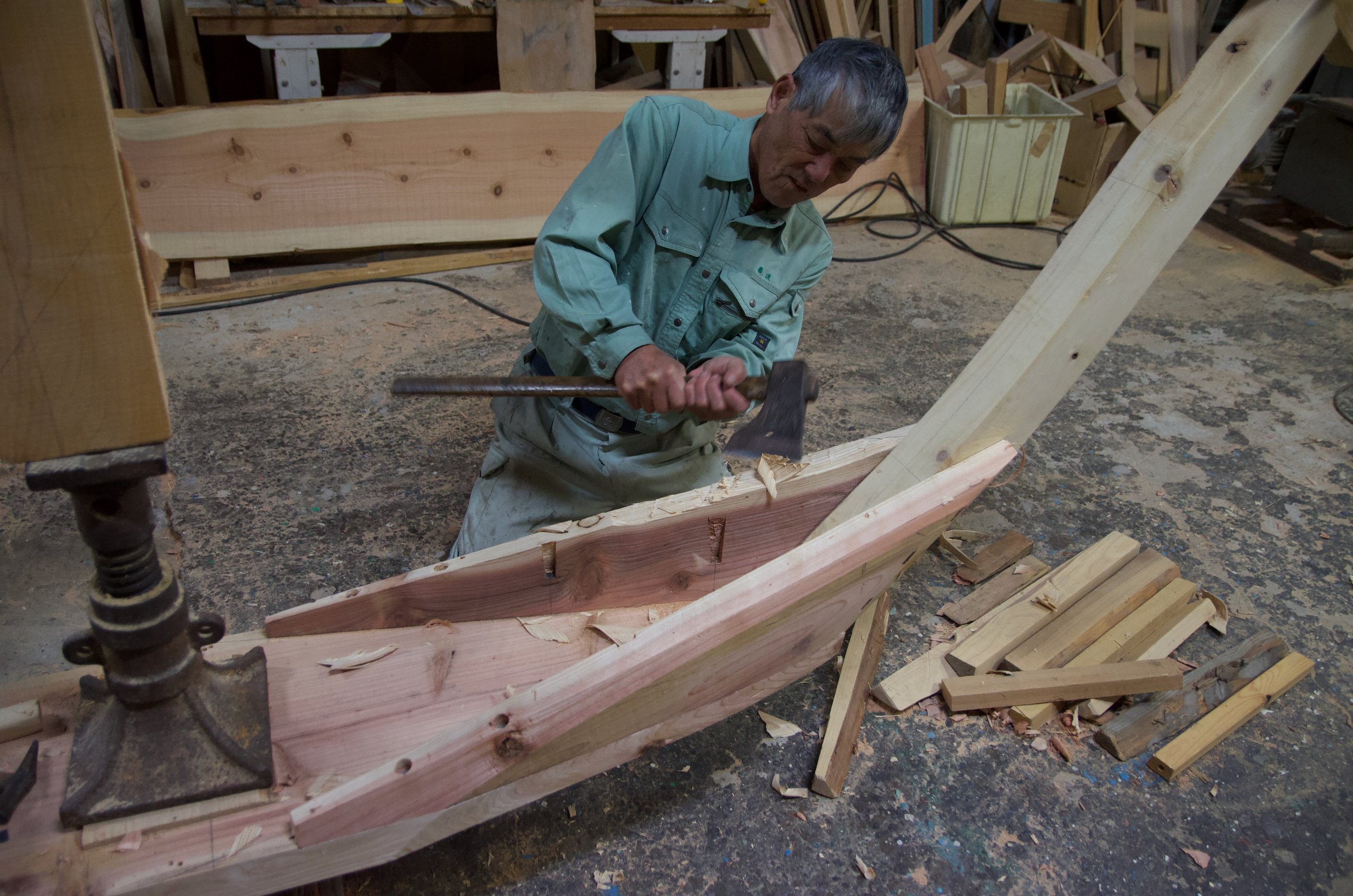 Bansho san working the strange boxed keel, a feature of small boats in this region.