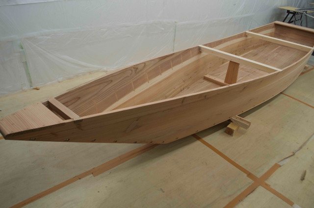 The completed boat. Note the lack of frames and the plugs along the inside planking where the planks were edge-nailed.