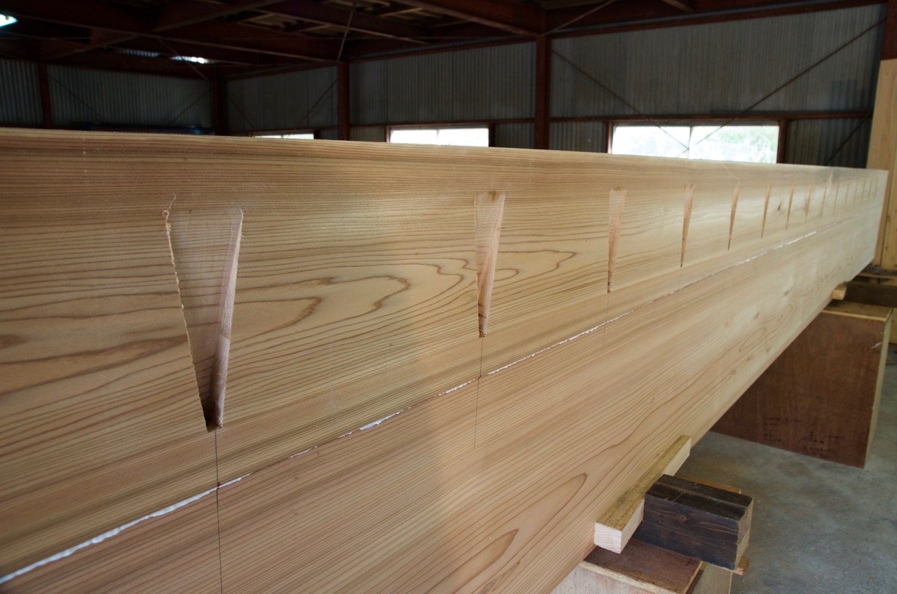 Mortises along the sides which are composed of two planks edge-nailed.