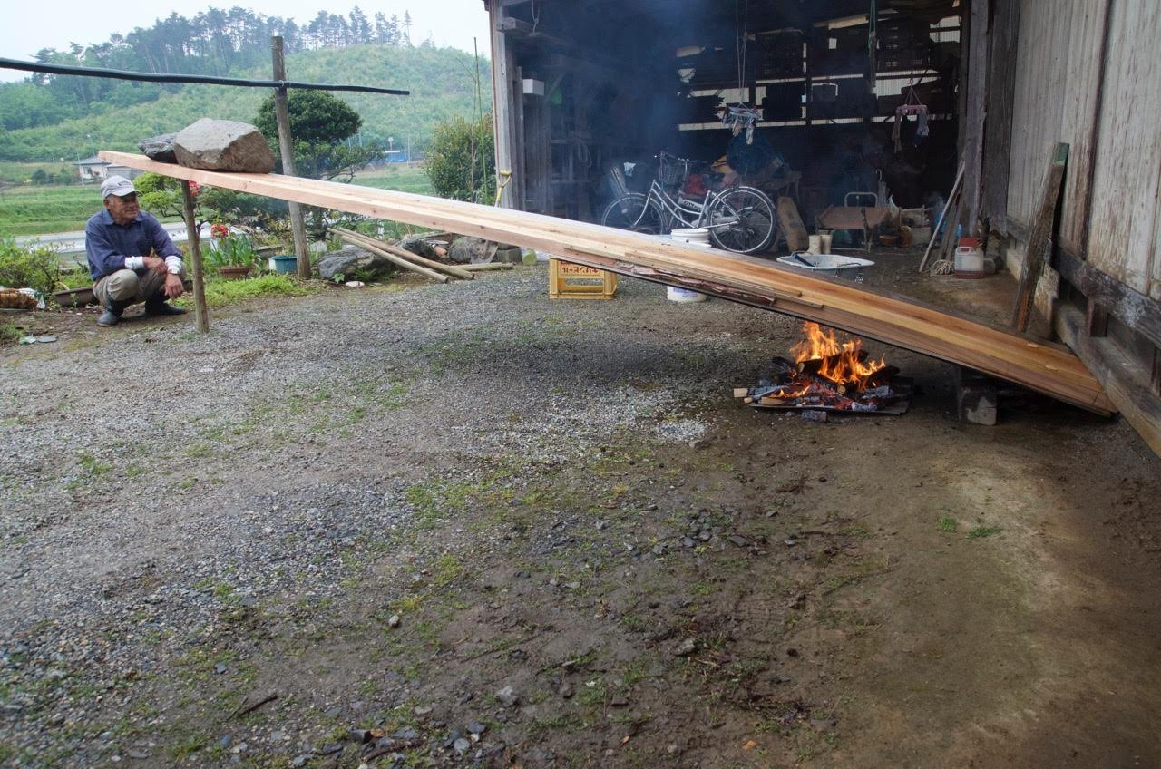Bending the bottom, composed of three thick planks edge-nailed together. The bottom was propped under the house and weighted with stones.