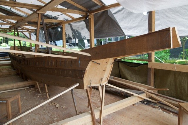 The sheer planks at the bow and stern support decks.