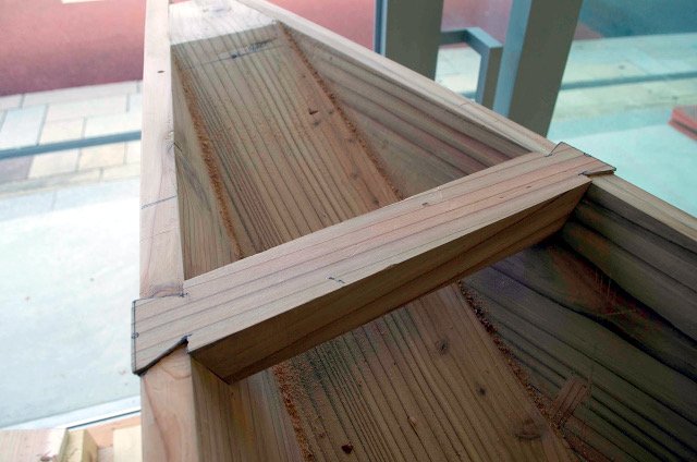 Detail of the forward beam, showing the half lap shouldered dovetail joinery used in these boats.