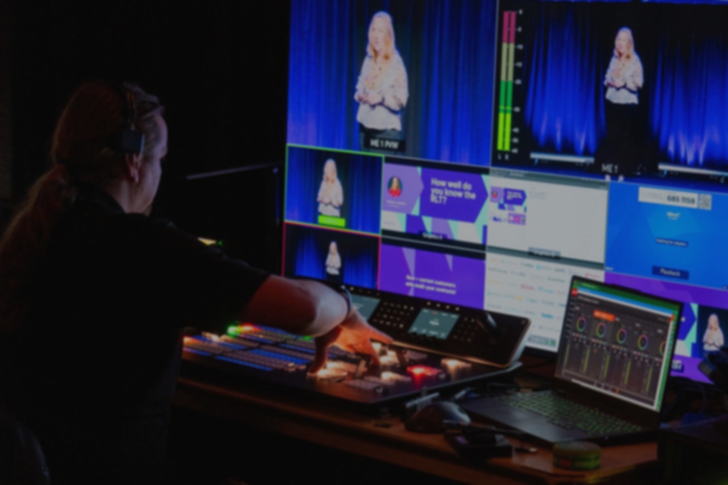 Live switching director running multi-camera video production for an event