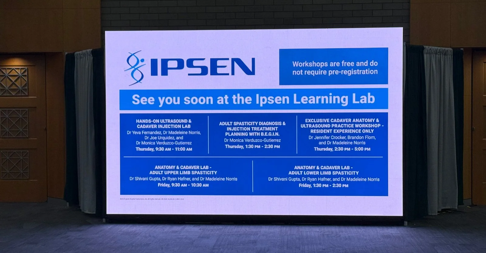 10x10 LED wall in conference hallway showing sponsor branding and booth promotion