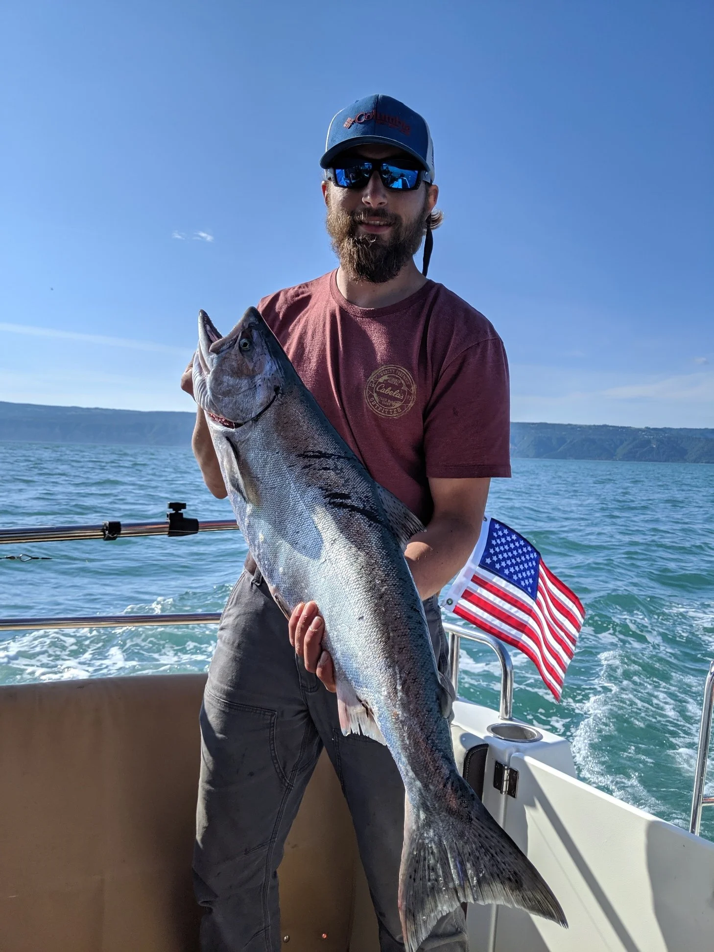 Beautiful day in Homer, Alaska with another Salmon onboard!