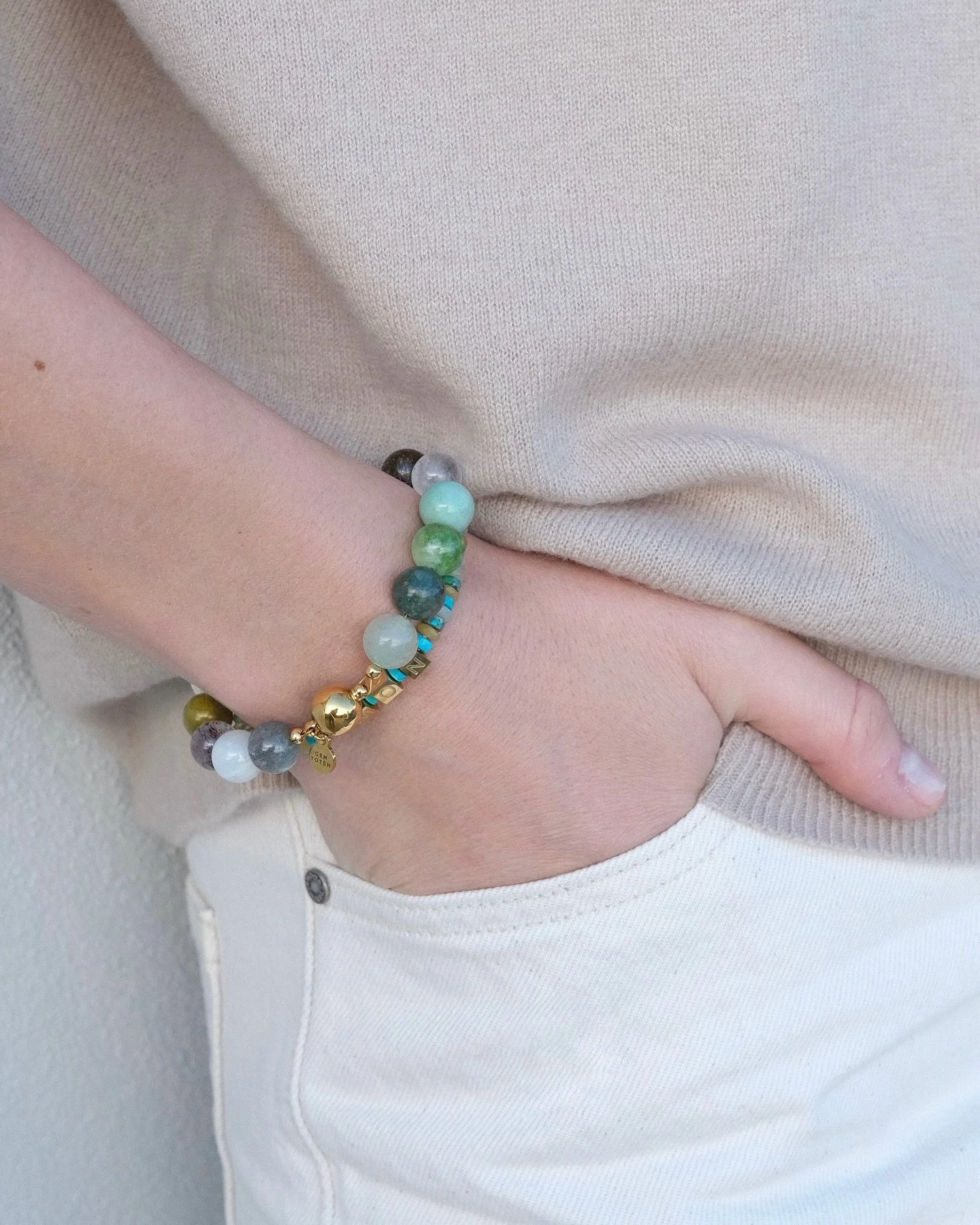 From our Postcards in Colour series &mdash; the Tulum bracelet.

Earthy beige and brown tones, softened by green, with a striking touch of malachite.

Stackable, seasonless, and quietly radiant. The kind of piece that warms your whole look. 

Each pi