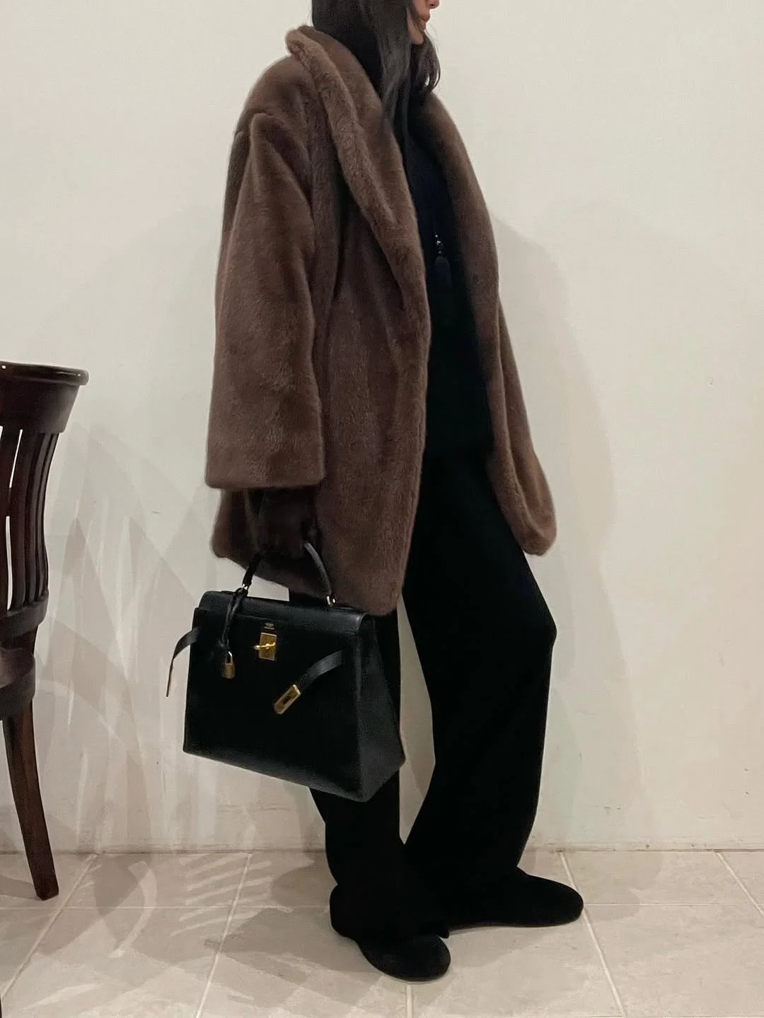 Black on black: the Totem Tassel necklace in black onyx blending into the look, styled and worn by muse @mai.snk