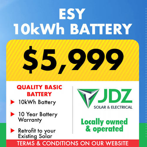 Sign advertising ESY 10kWh battery for $5,999, with features including 10-year warranty and retrofit options, from JDZ Solar & Electrical, locally owned and operated.