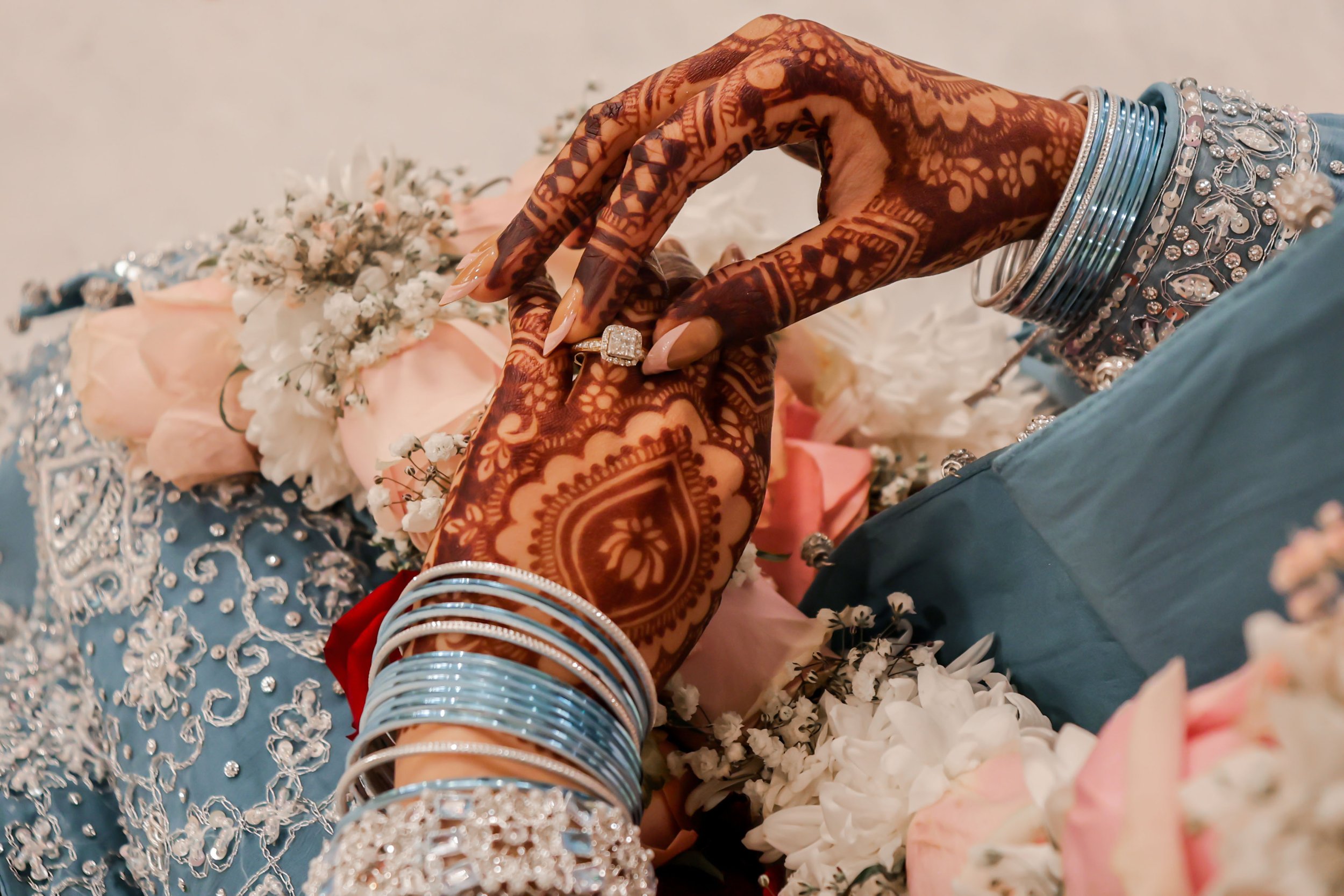 297A4179 Closeup Asma holding ring Best Image.114 Final Edit.jpg