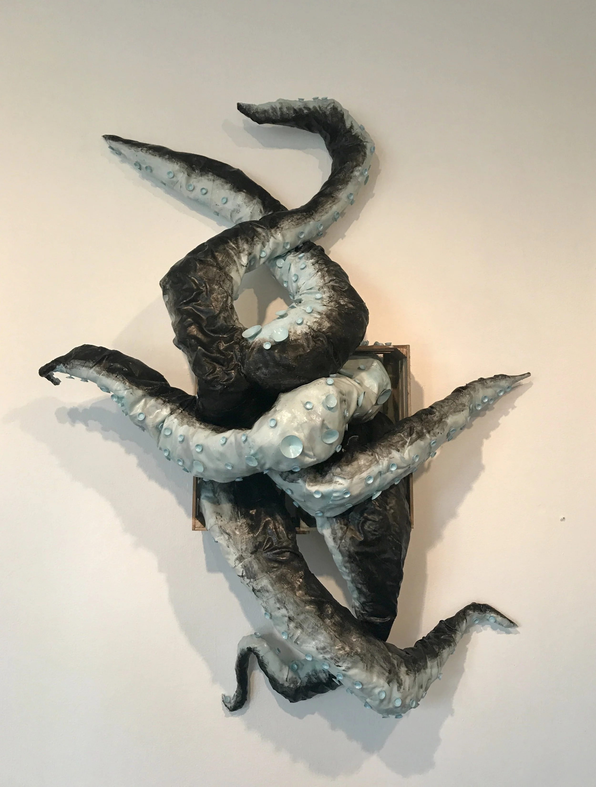 Return to Sender (2017). Wood, fabric, acrylic paint sculpture. Displayed at the student-led art exhibition "BLACKLIGHT" at Art League Houstin in 2017.