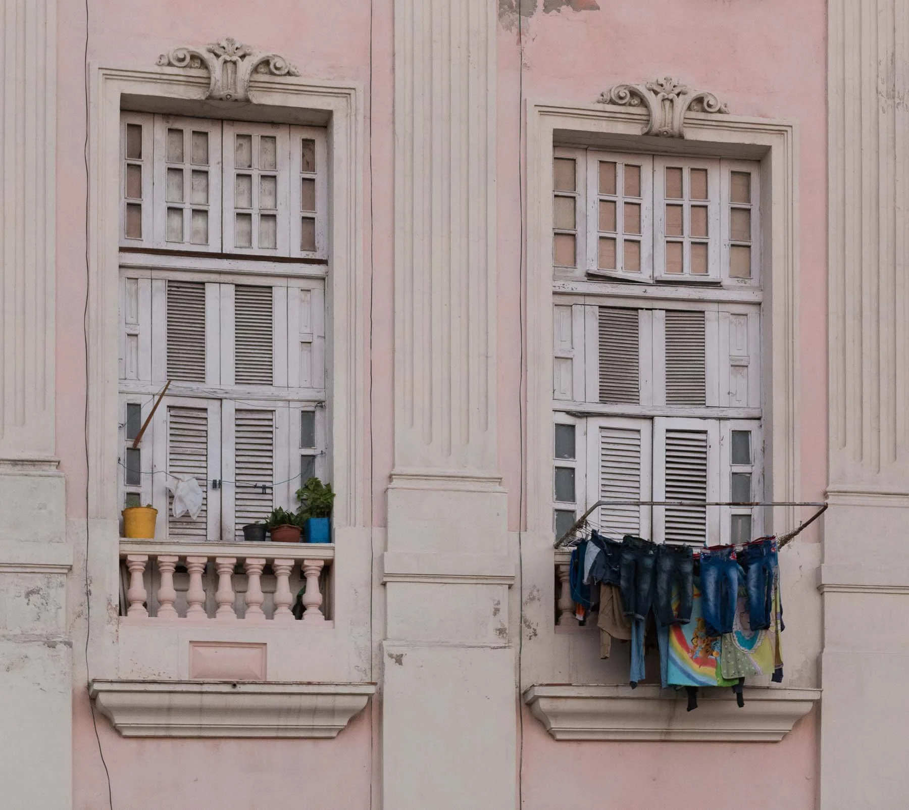 Spanish colonial house with laundry drying  captured by Raj Sarda Photography