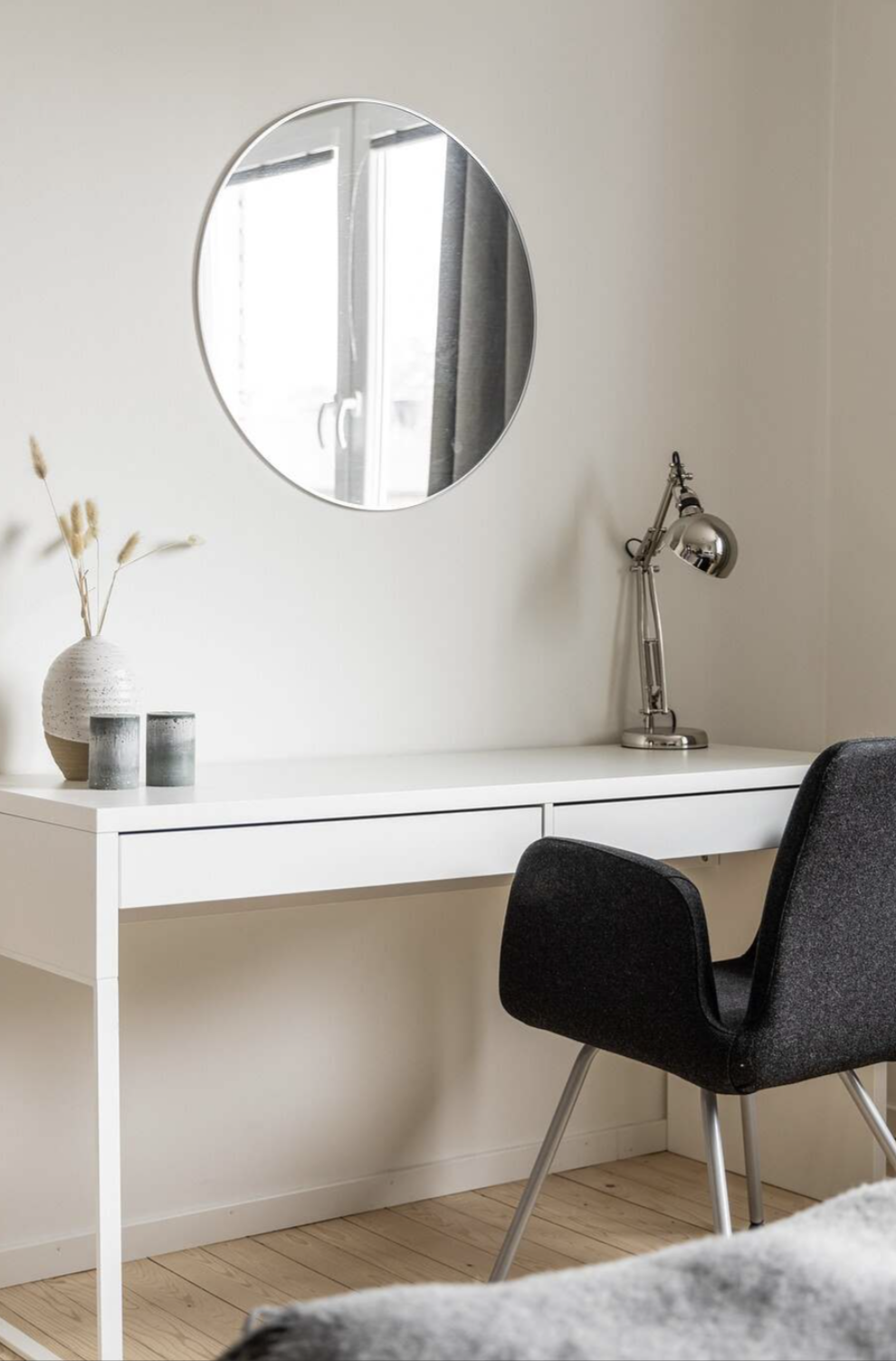 Cosy and light interior of desk and armchair