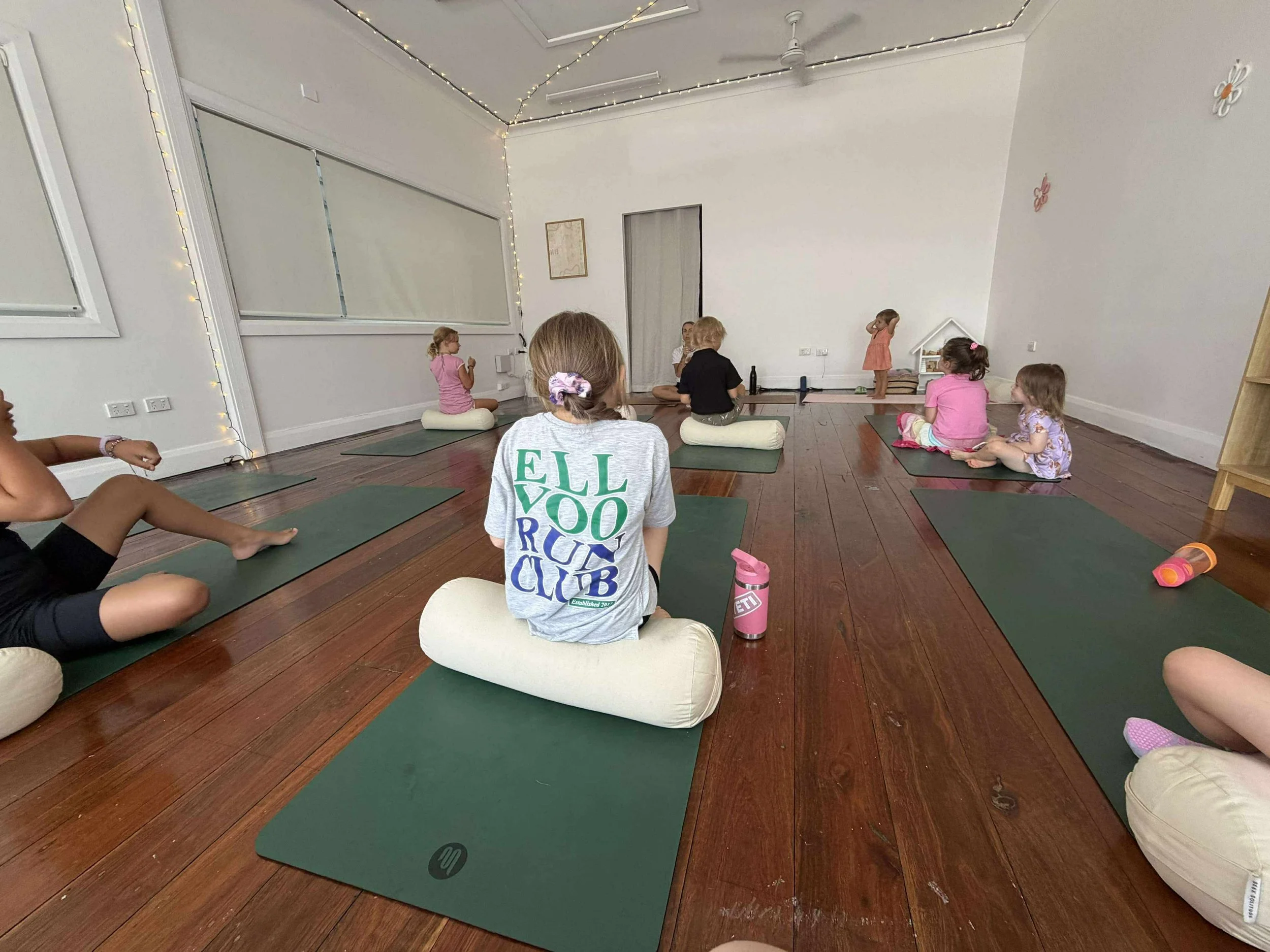 children doing a yoga class