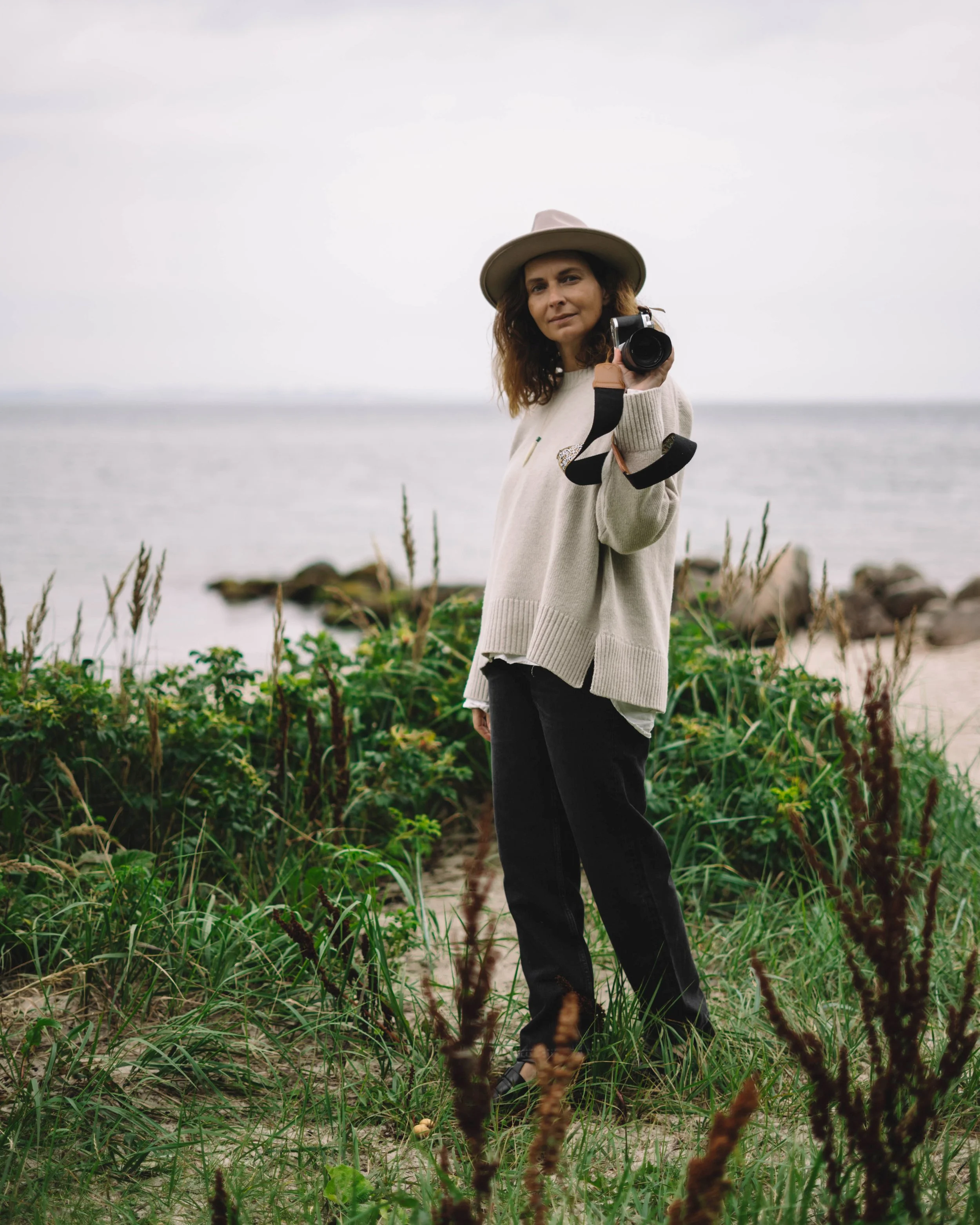 Gabi holding a camera