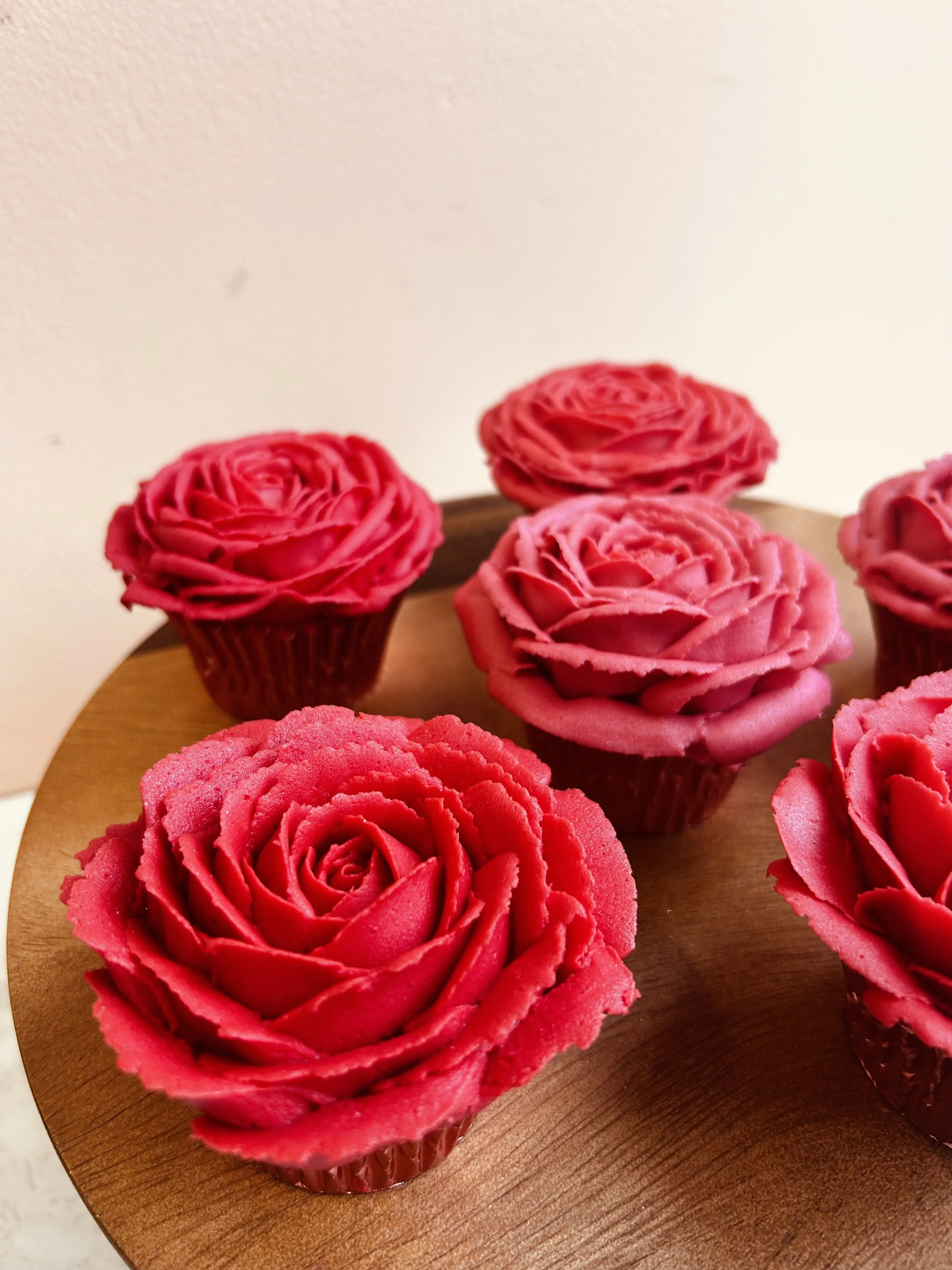 Dark pink rose decoarted cupcakes