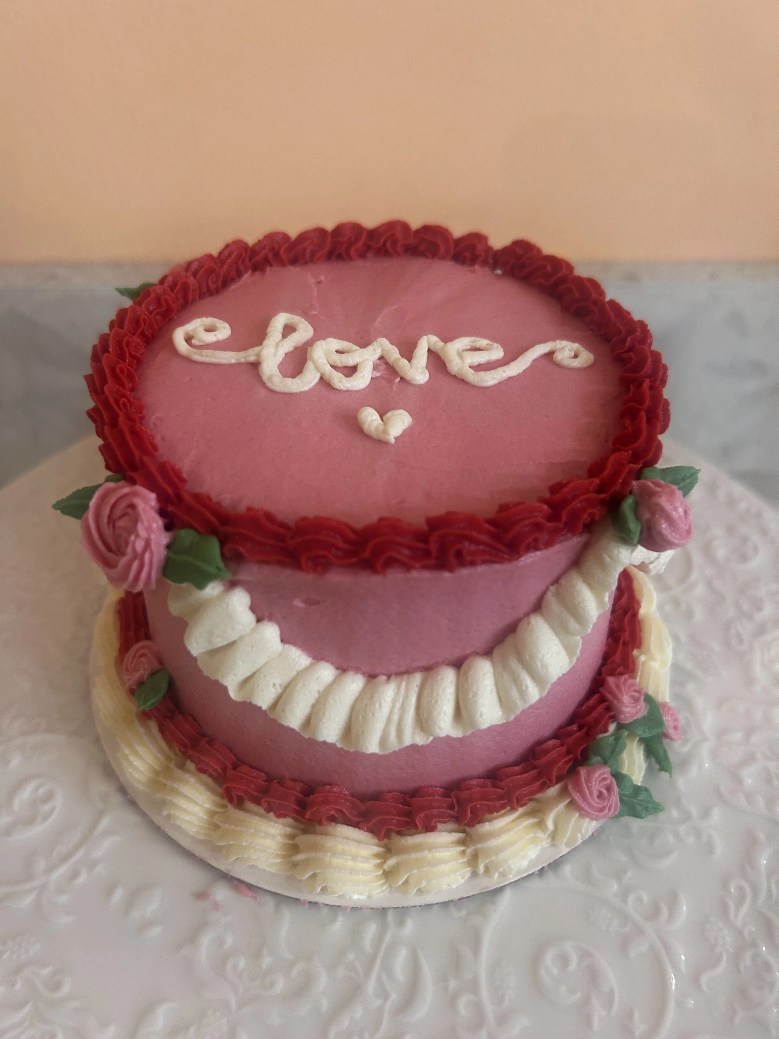 Mini pink and red bento cake from decoarting class at Baker & Chef