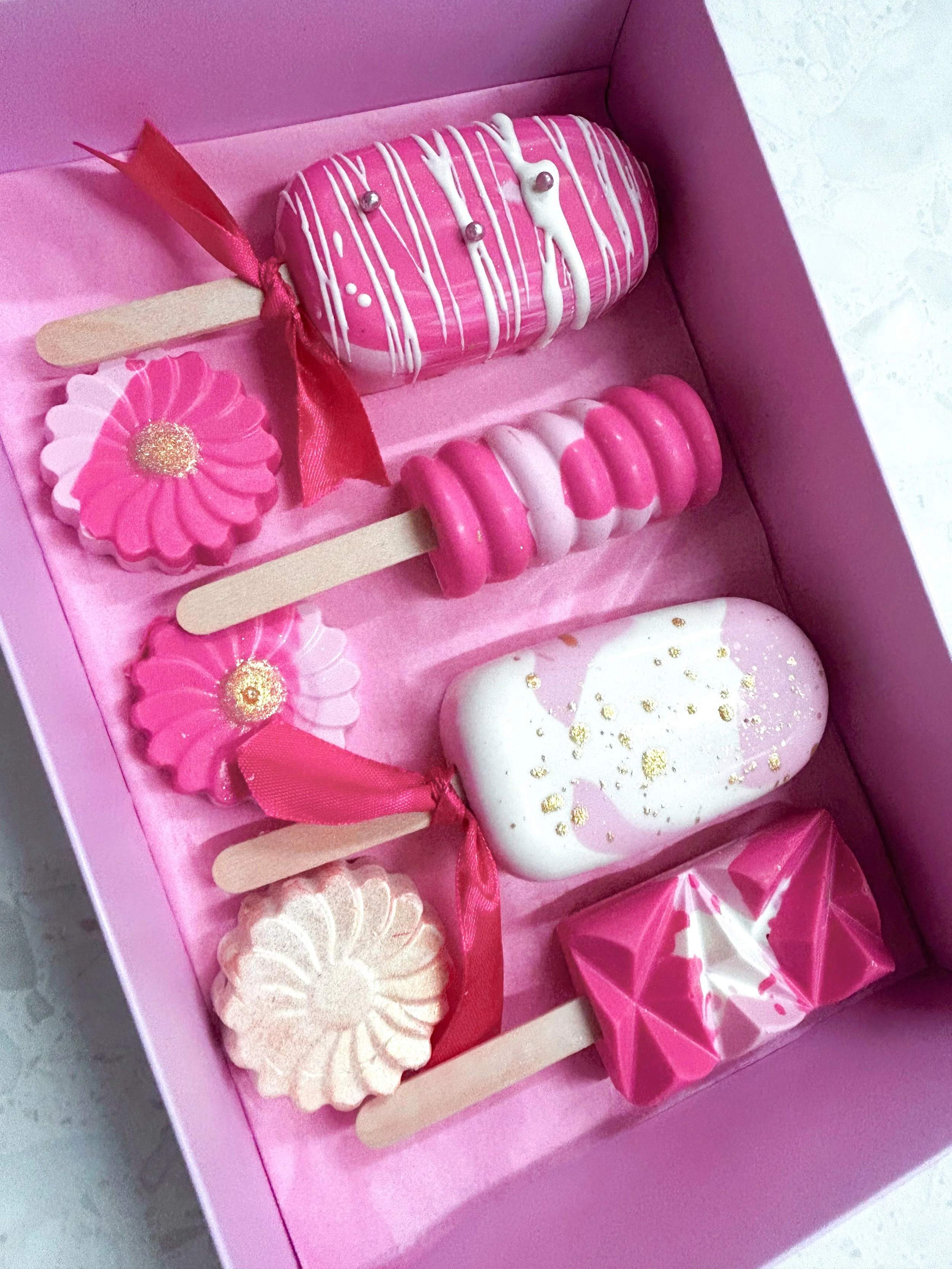 Pink cake pops from cake pop decorating class