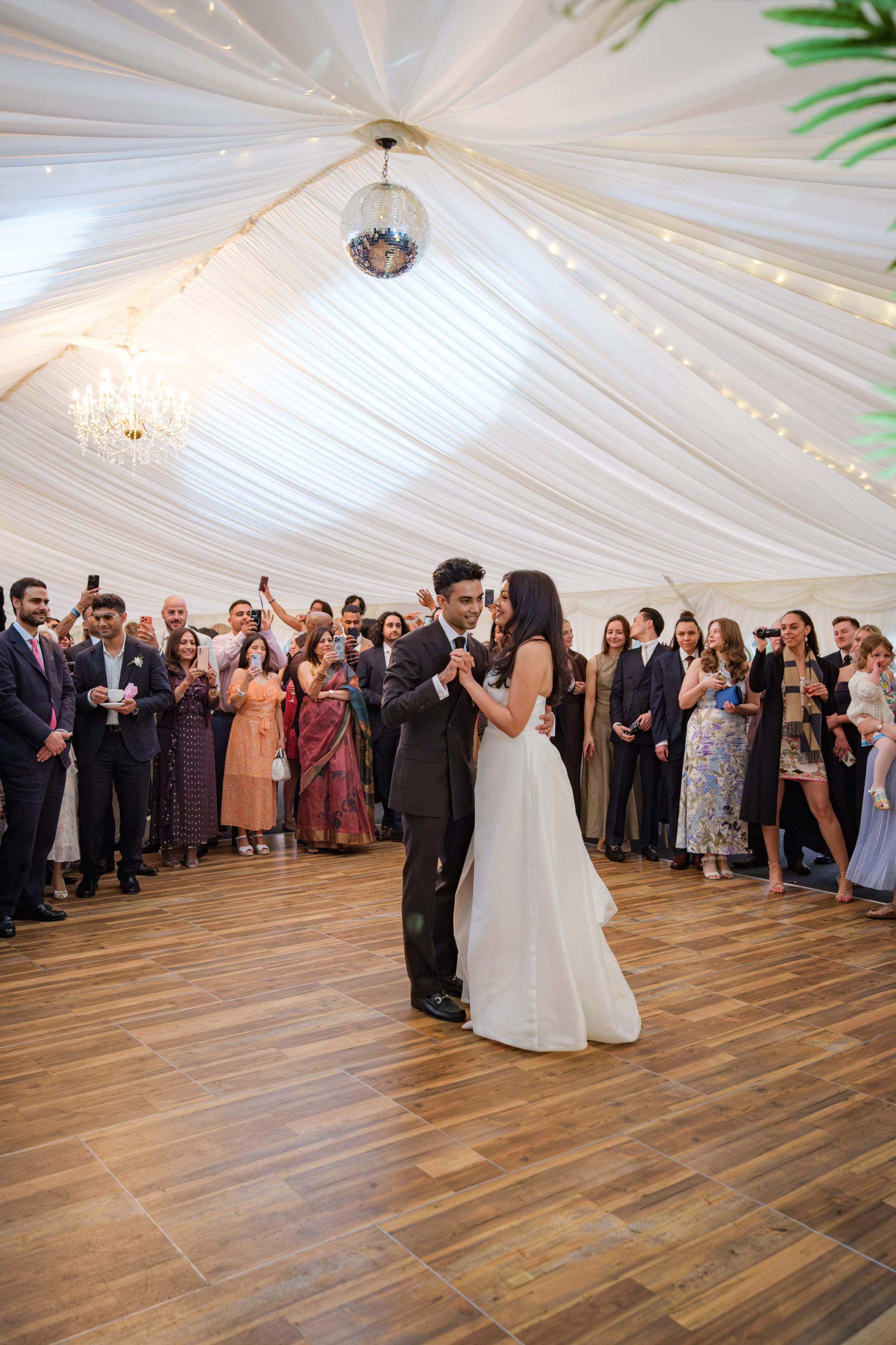 A happy wedding couple dancing