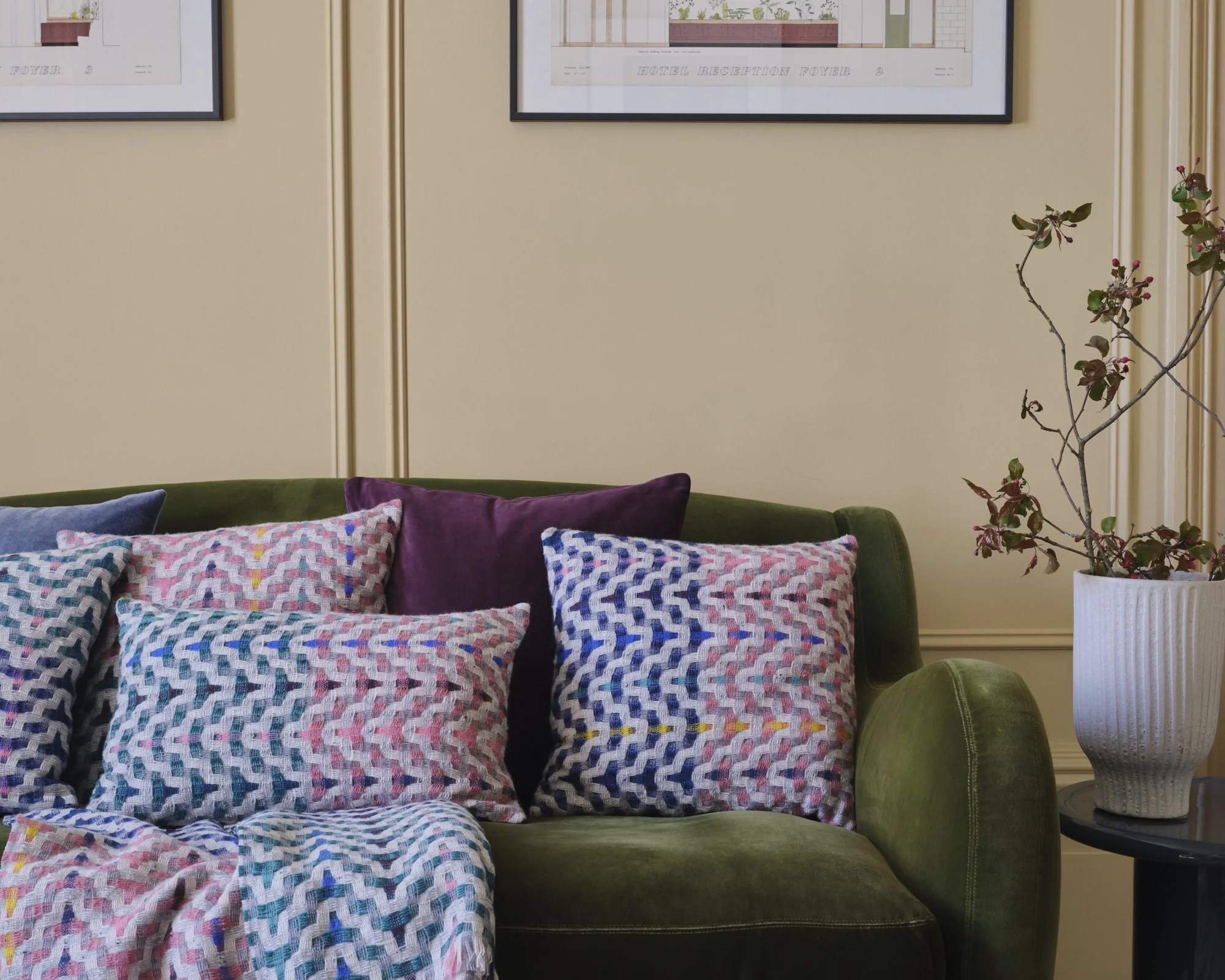 Bonnie_Kirkwood_Peacock collection on green sofa low res.jpg