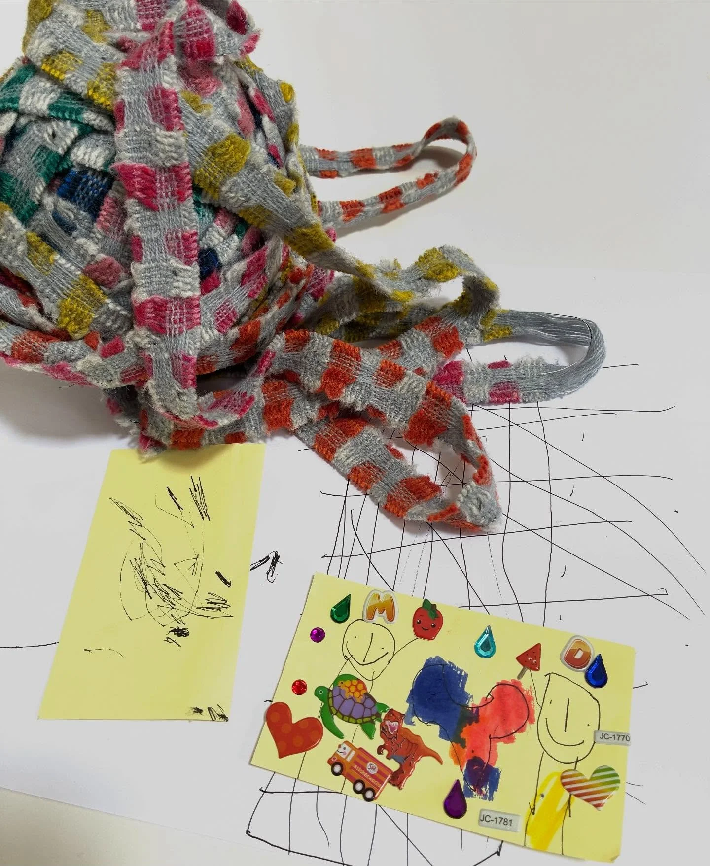 Threads of work and threads of life ✨
This ball of selvedge, left over from my throw production, sits beside two drawings from my children on my desk. It catches my eye daily - a small reminder of creativity in many forms. It keeps making me smile- w