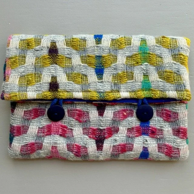 mustard and fuchsia woven bag
