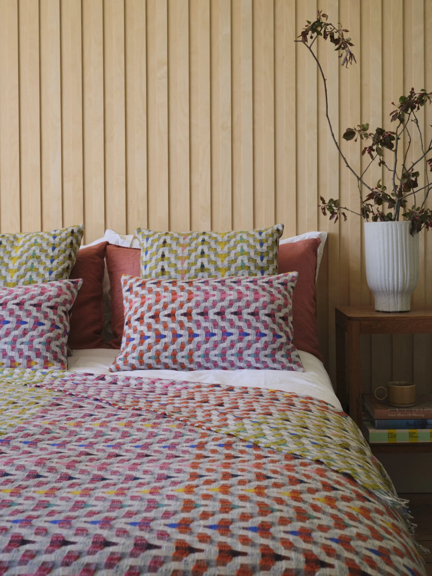 Bonnie_Kirkwood_Fuchsia Throw on Bed Low res.jpg