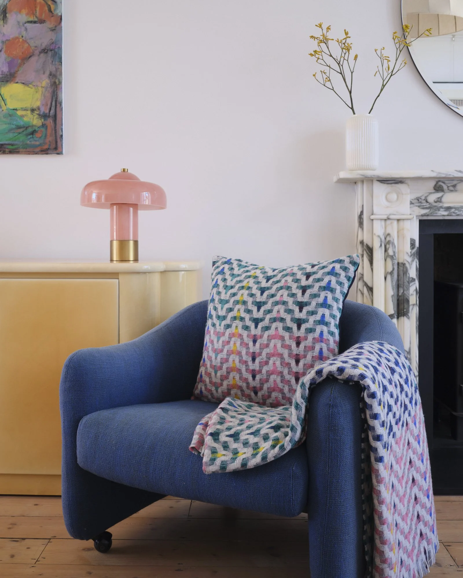 Bonnie_Kirkwood_peacock cushion on blue chair.jpg