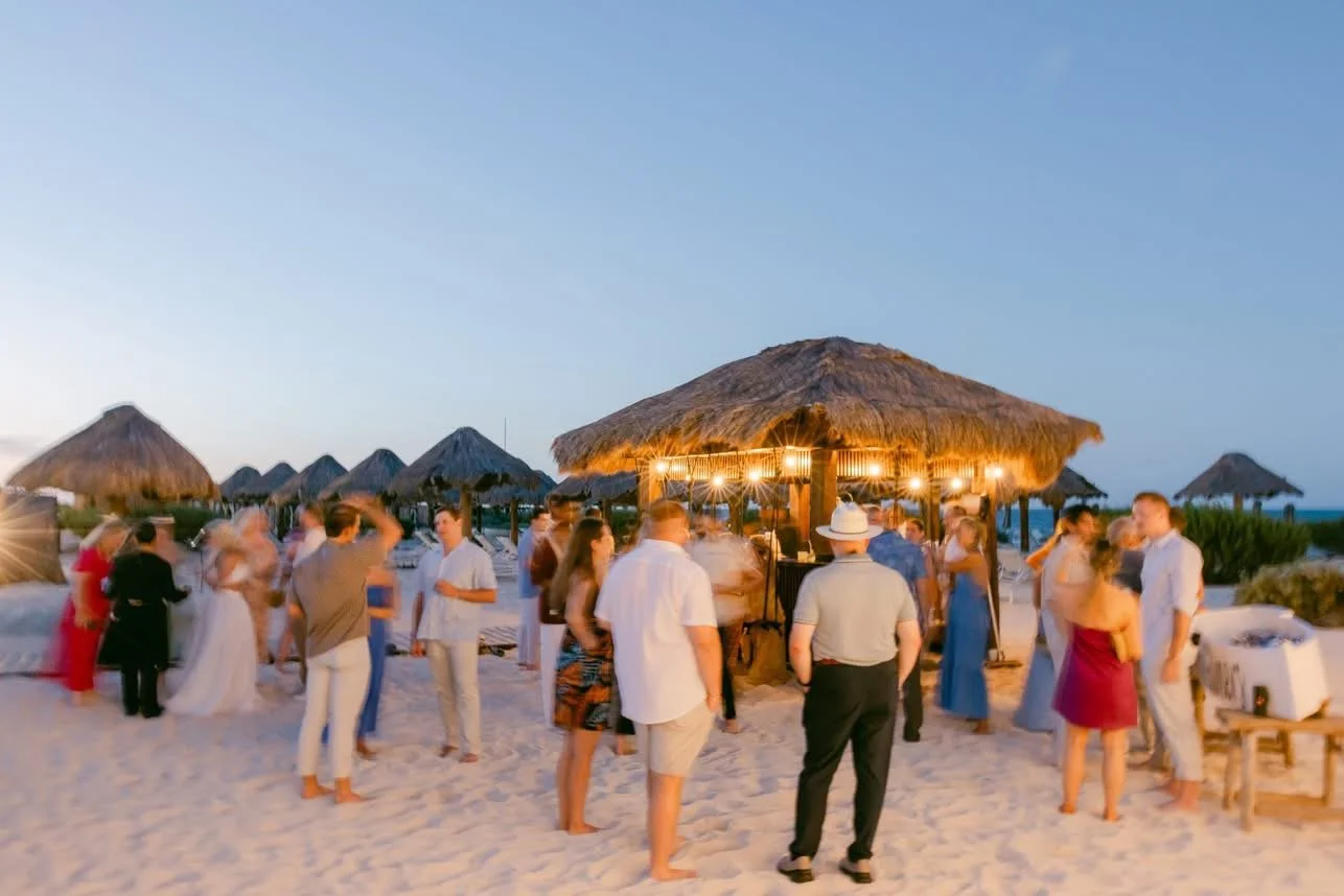 welcome party on beach at Mexico all-inclusive resort at sunset