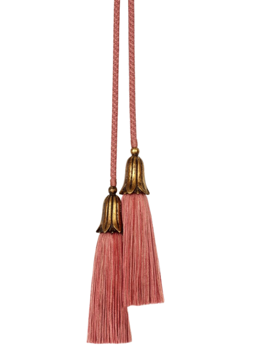 Two dusty pink tassels