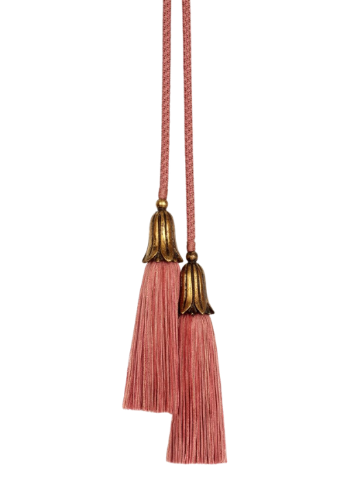 Two dusty pink tassels.