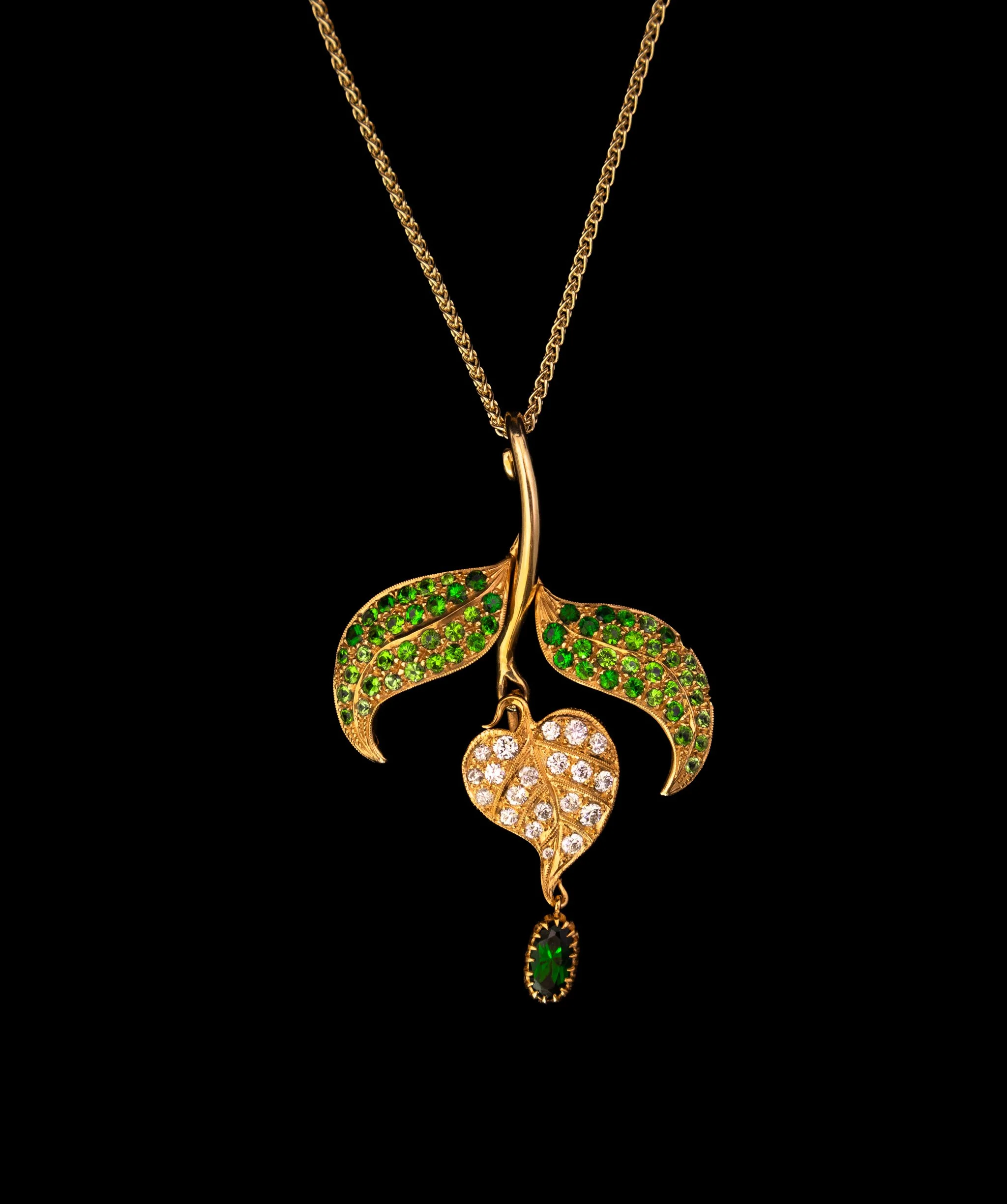 Interchangeable pin and pendants. Ethiopian Opal, fancy colored sapphires, golden beryls, tsavorite garnets. 18 kt yellow and rose gold. Additional diamonds and single tsavorite garnet. 