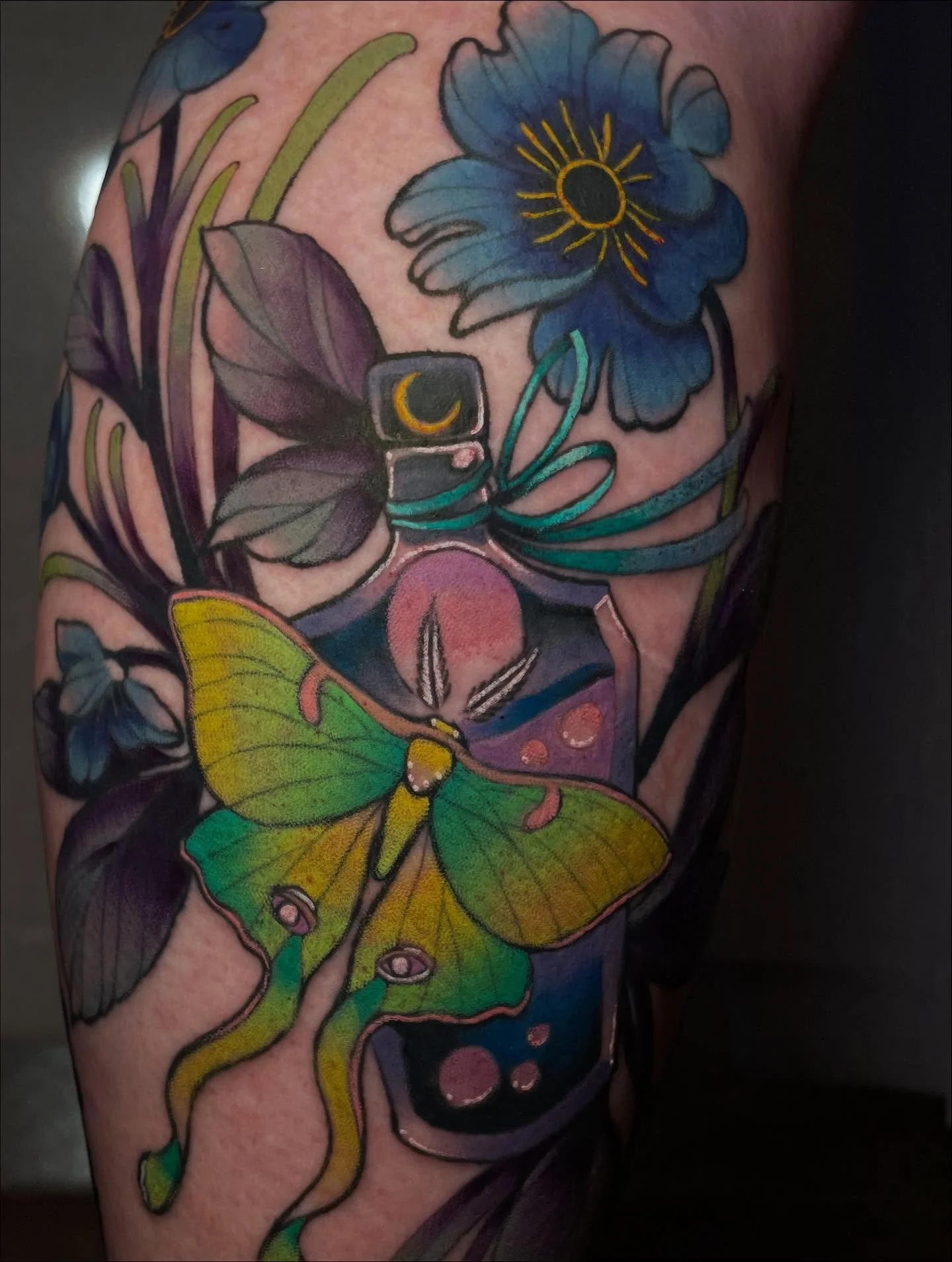 @empusa83 let me finish this fun lunar moth piece on her calf recently! The lines and black are healed and the color is fresh 🌱💚🖤 
.
Thank you for coming in for years now 🤯 we&rsquo;ve gotten to do so many cool pieces together! Thank you for your