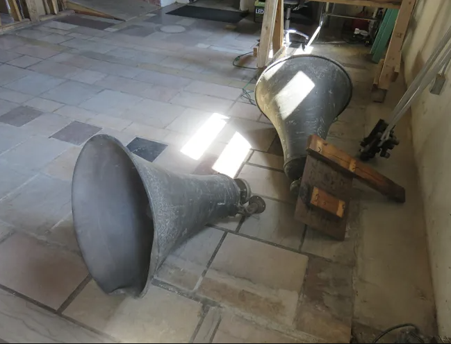 Old air raid siren horns sit in basement of church. John Shearer/Shopper News